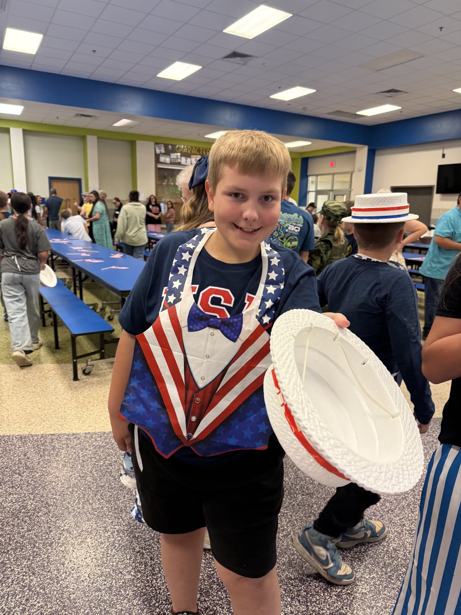 child dressed as uncle sam for veterans program