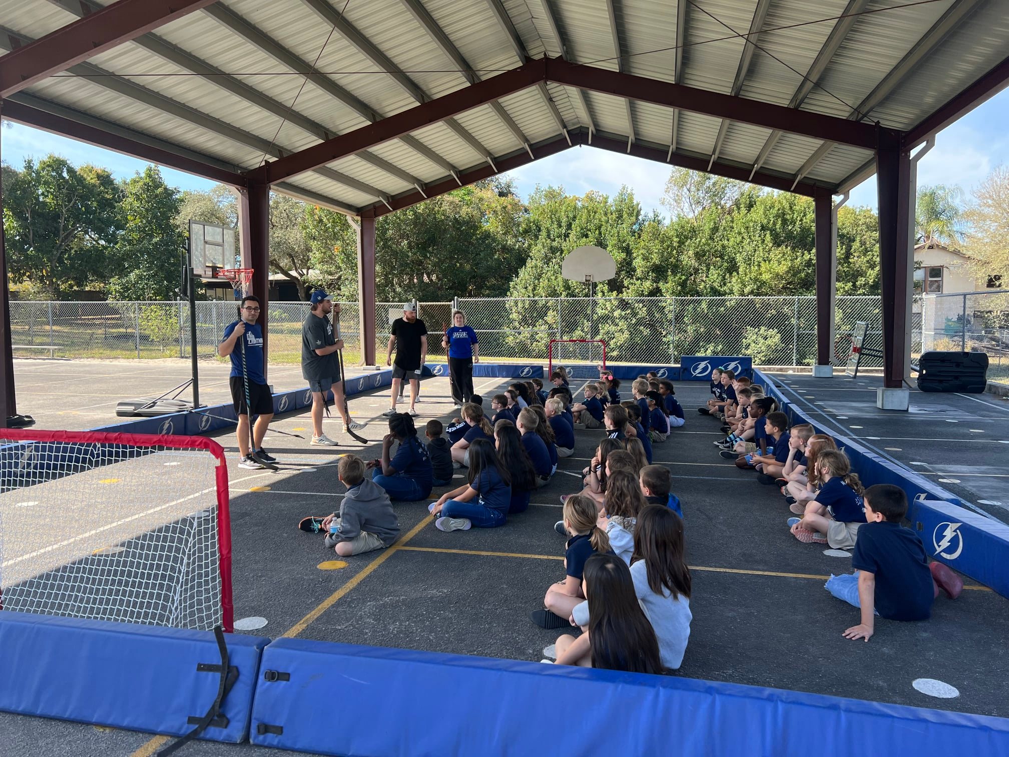 2nd grade students learning about the Street Hockey Team