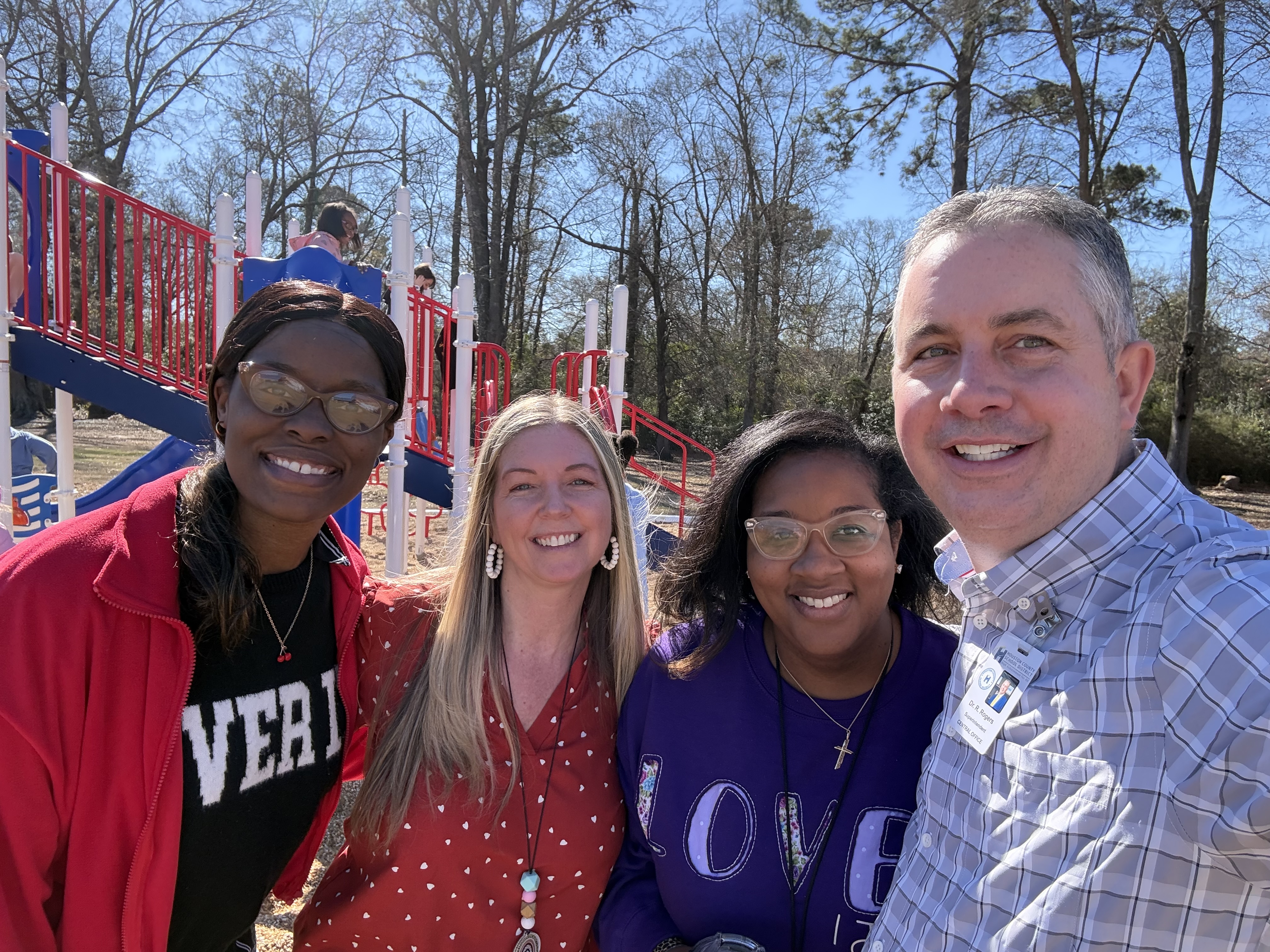 Dr. Rogers with teachers