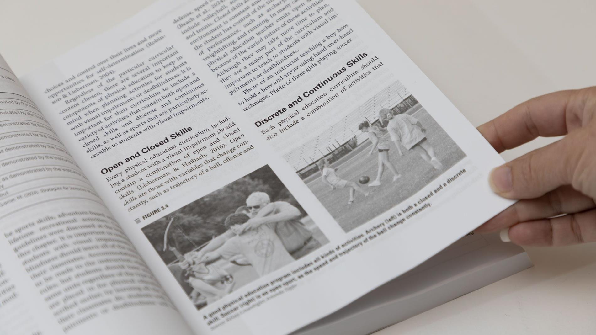 a photo of a PE book open