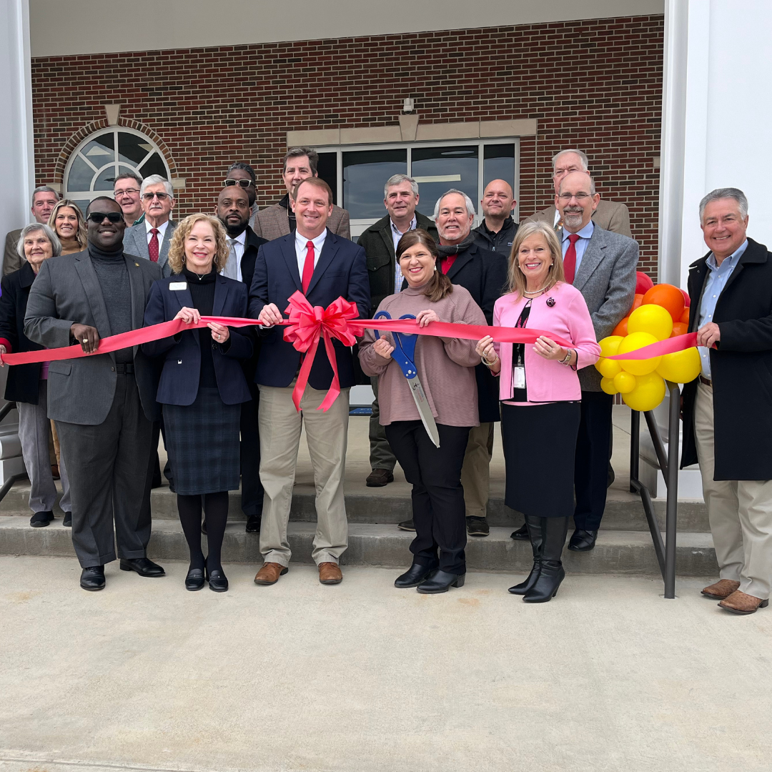 Picture of Community & District Leaders Cutting the Ribbon on New Prattville Kindergarten School