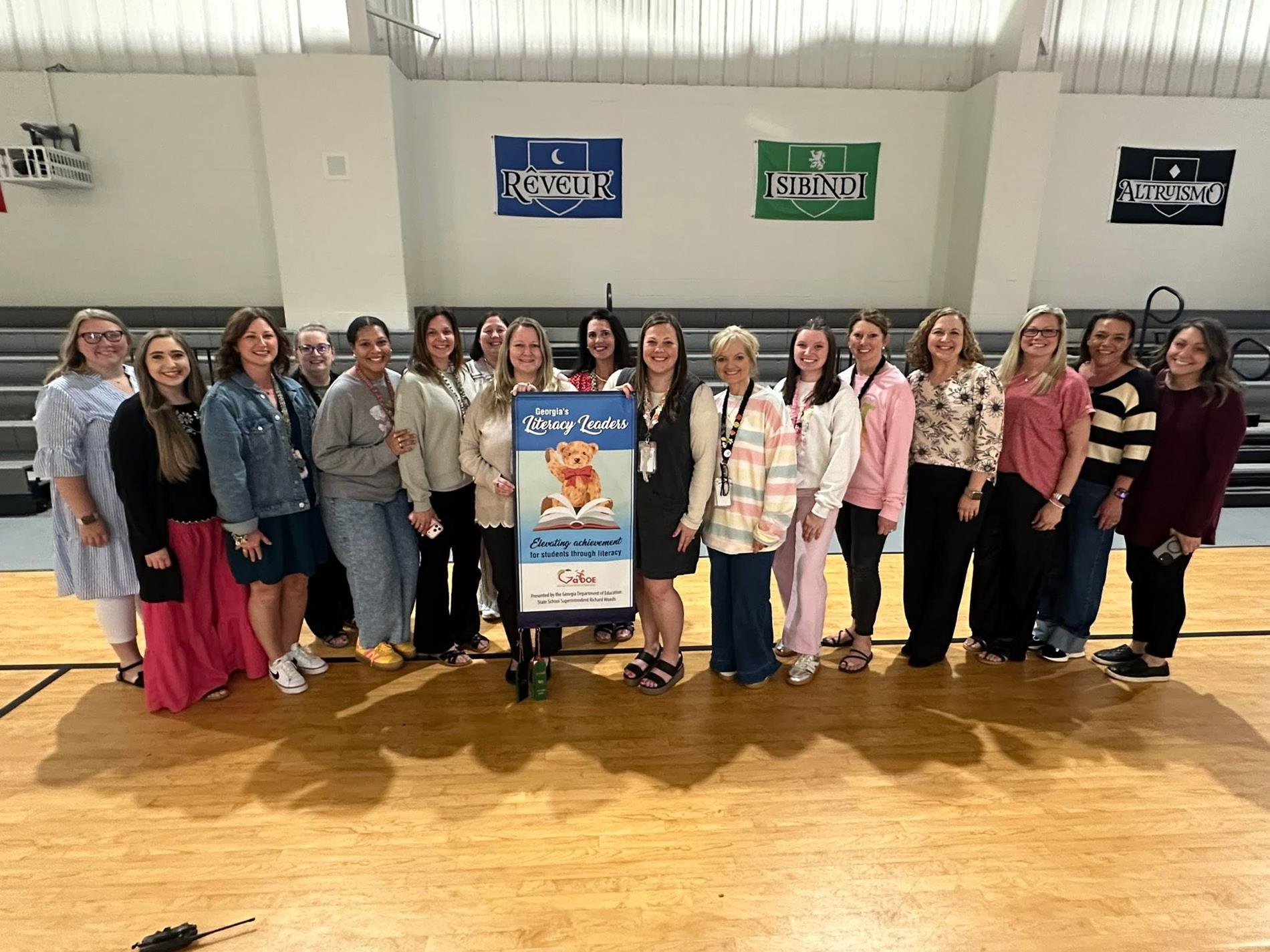 teachers with literacy leads banner
