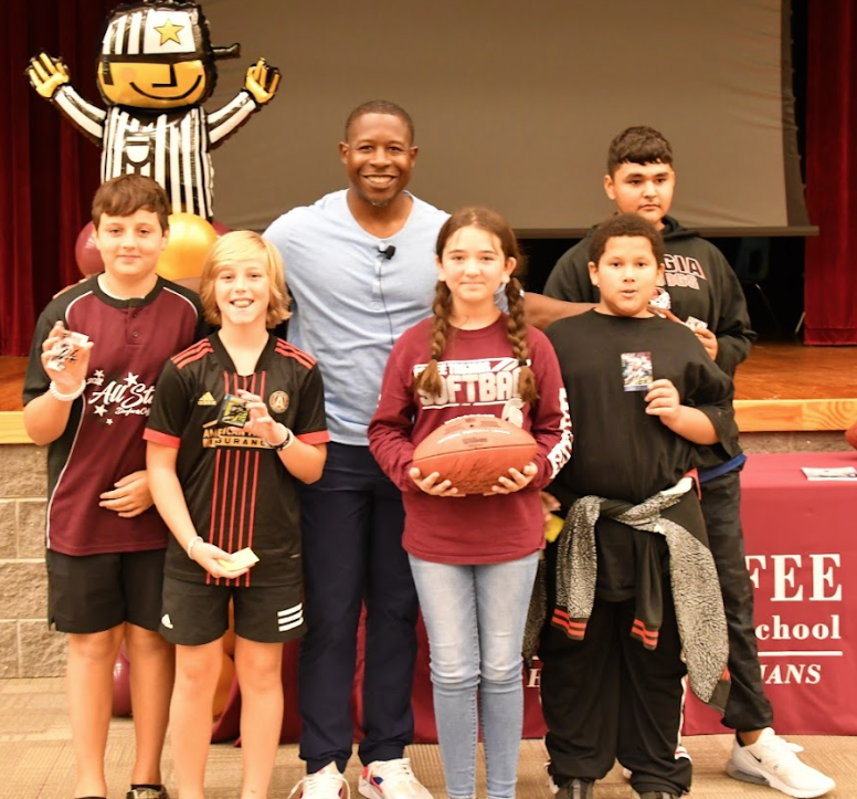 Adrian Peterson with CMS students 