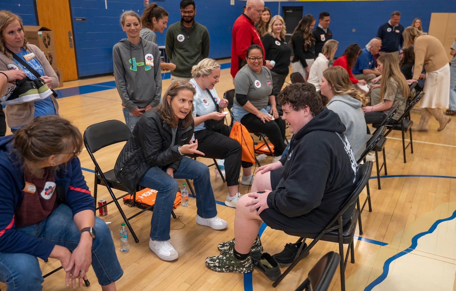 BCMS Students receiving new shoes/socks