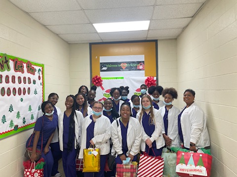 Health Science Students preparing to take gifts to the nursing home patients