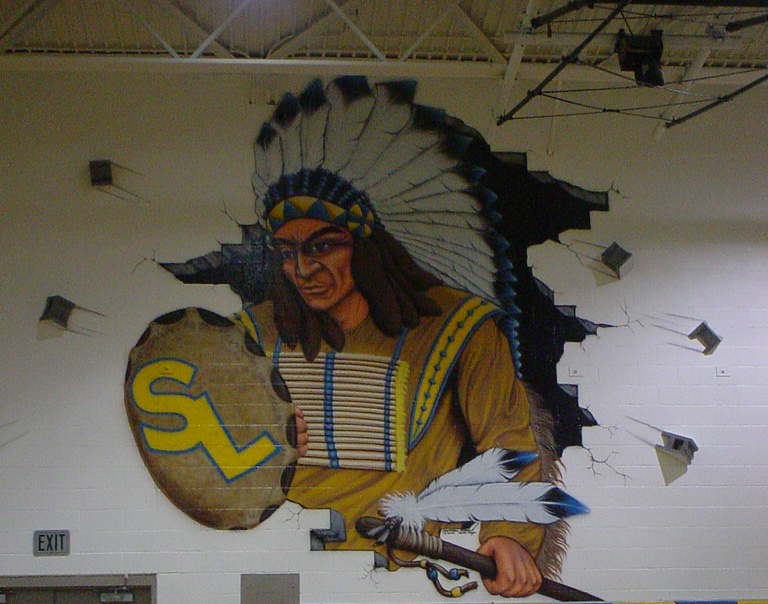 Mascot on the HS gym wall