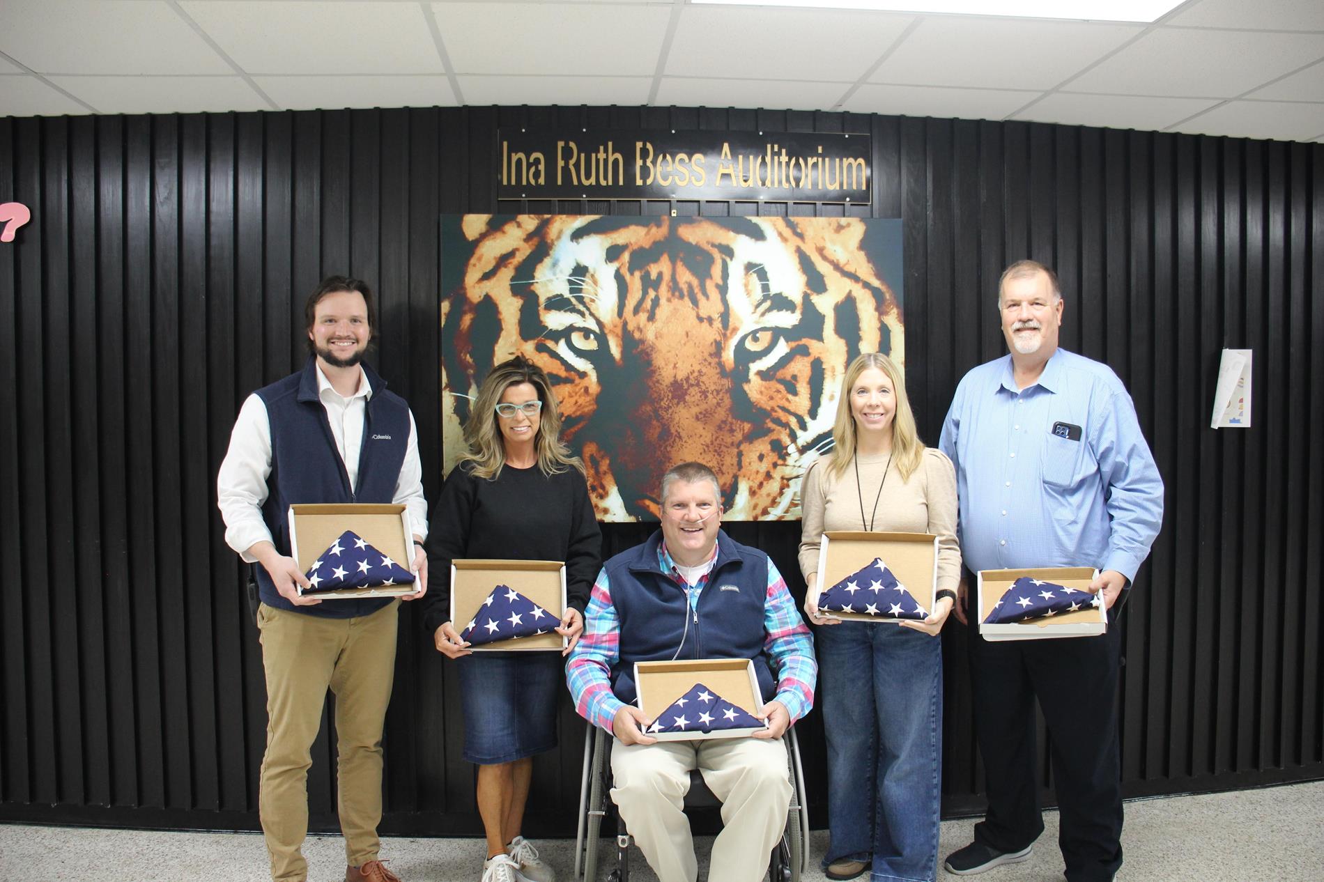 State Rep Michael Hale presents flags for each classroom