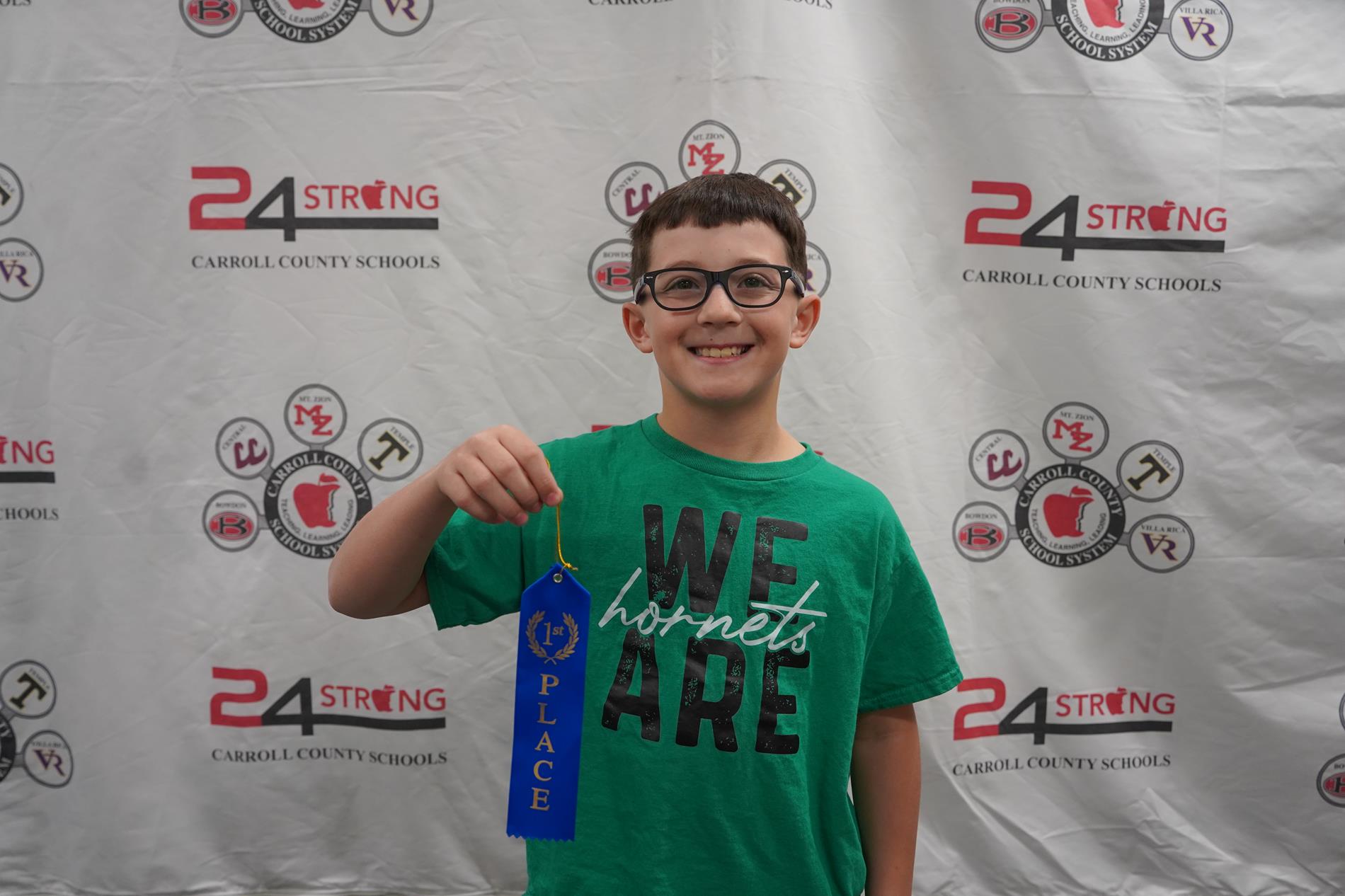 Student with First place ribbon