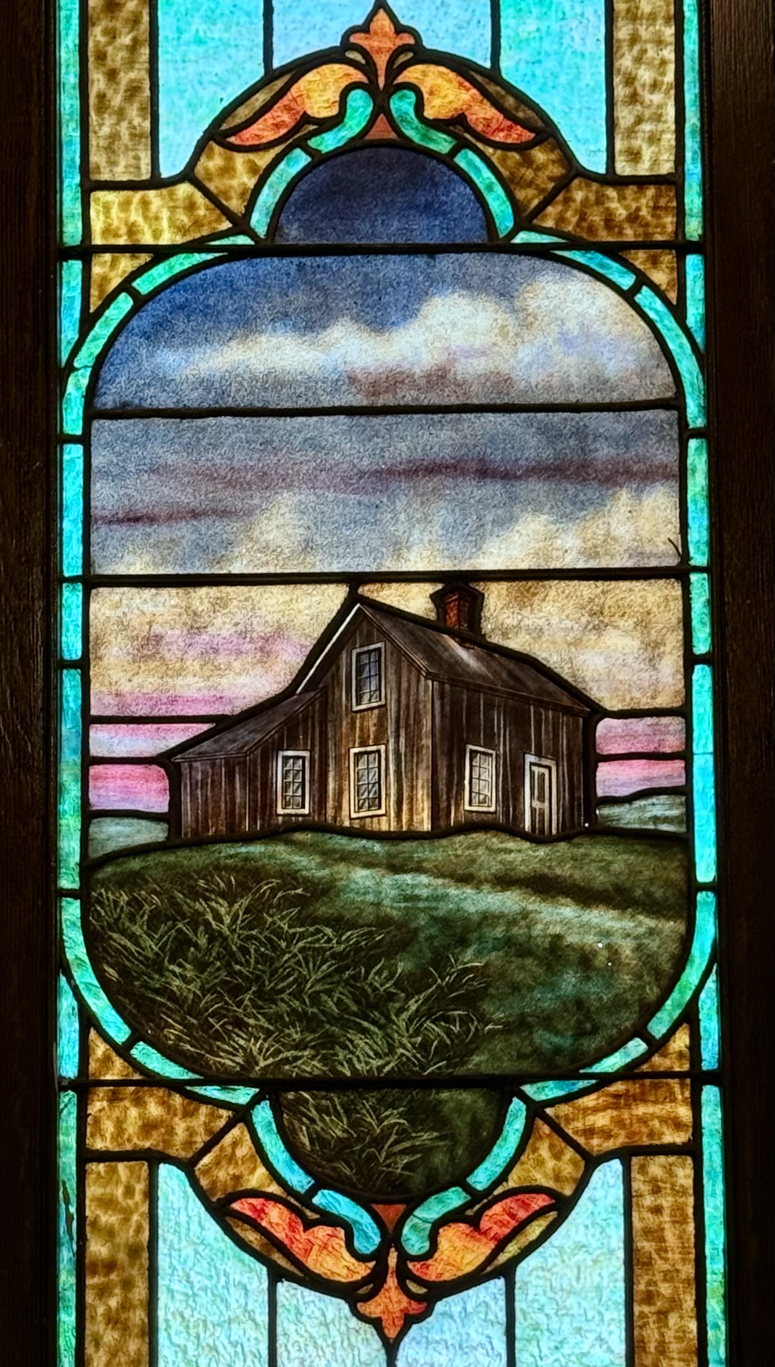 stained Glass window of the first church of St. Edward