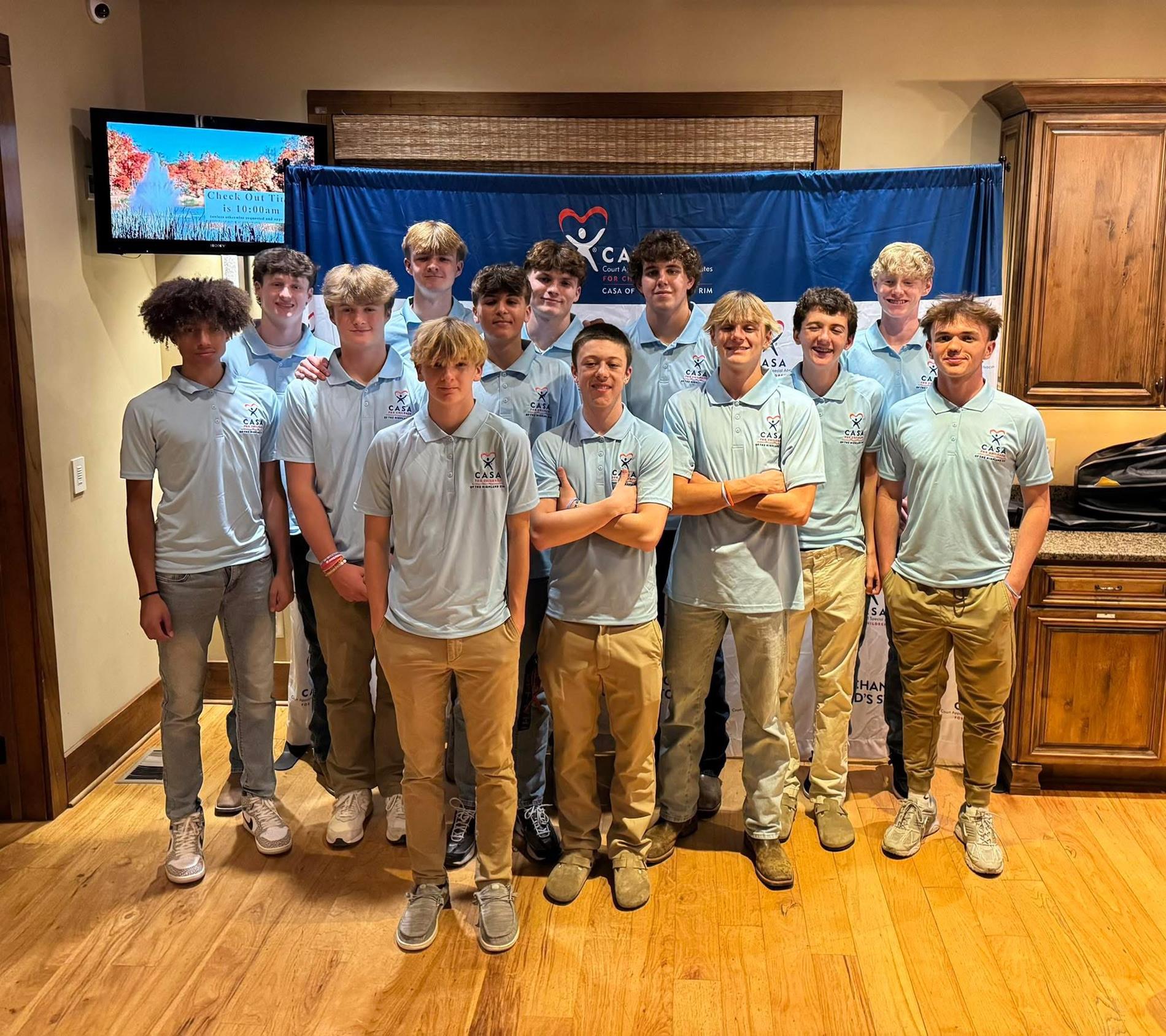 2025-26 HCHS Basketball Team volunteers at a community event