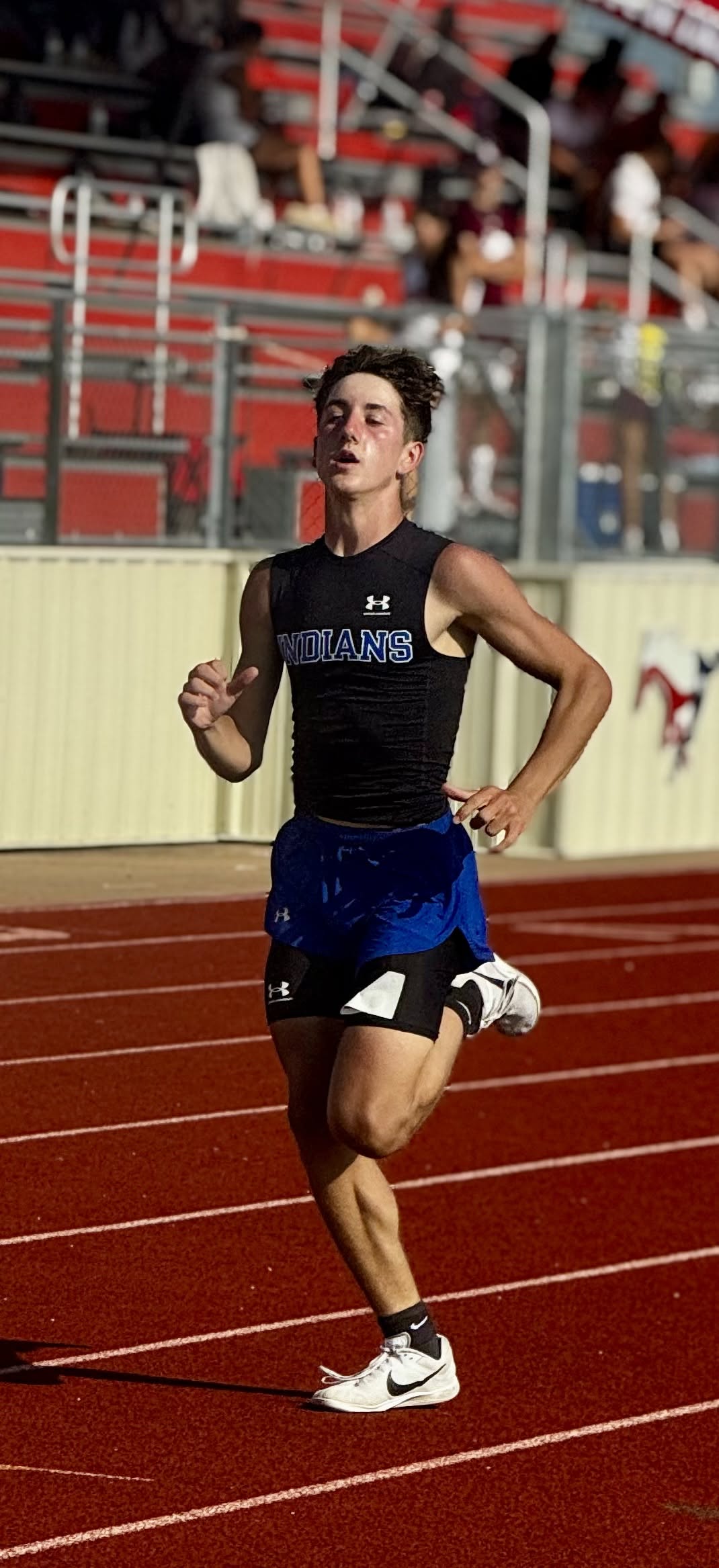 high school boy running track