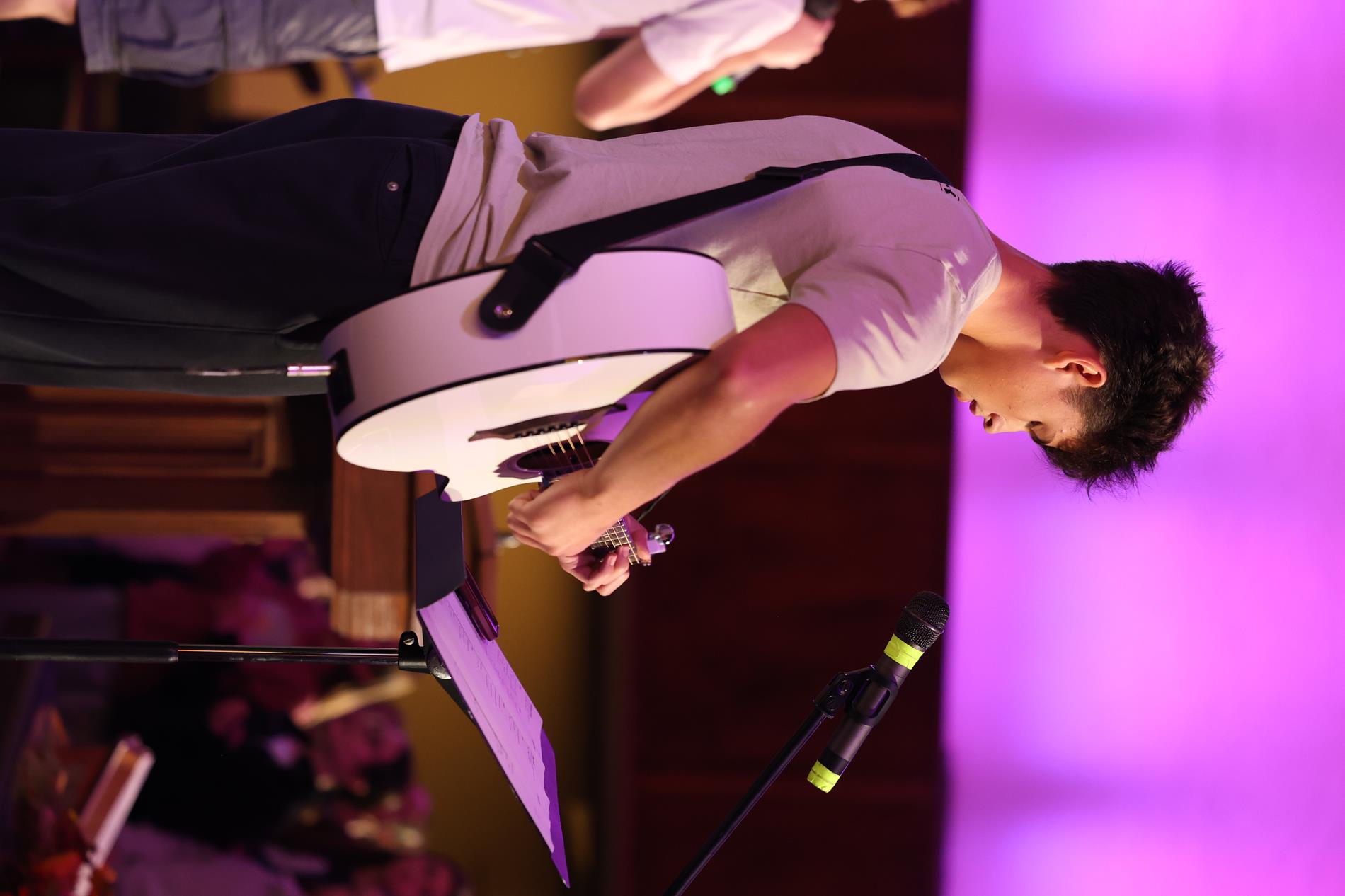 Student Playing Guitar