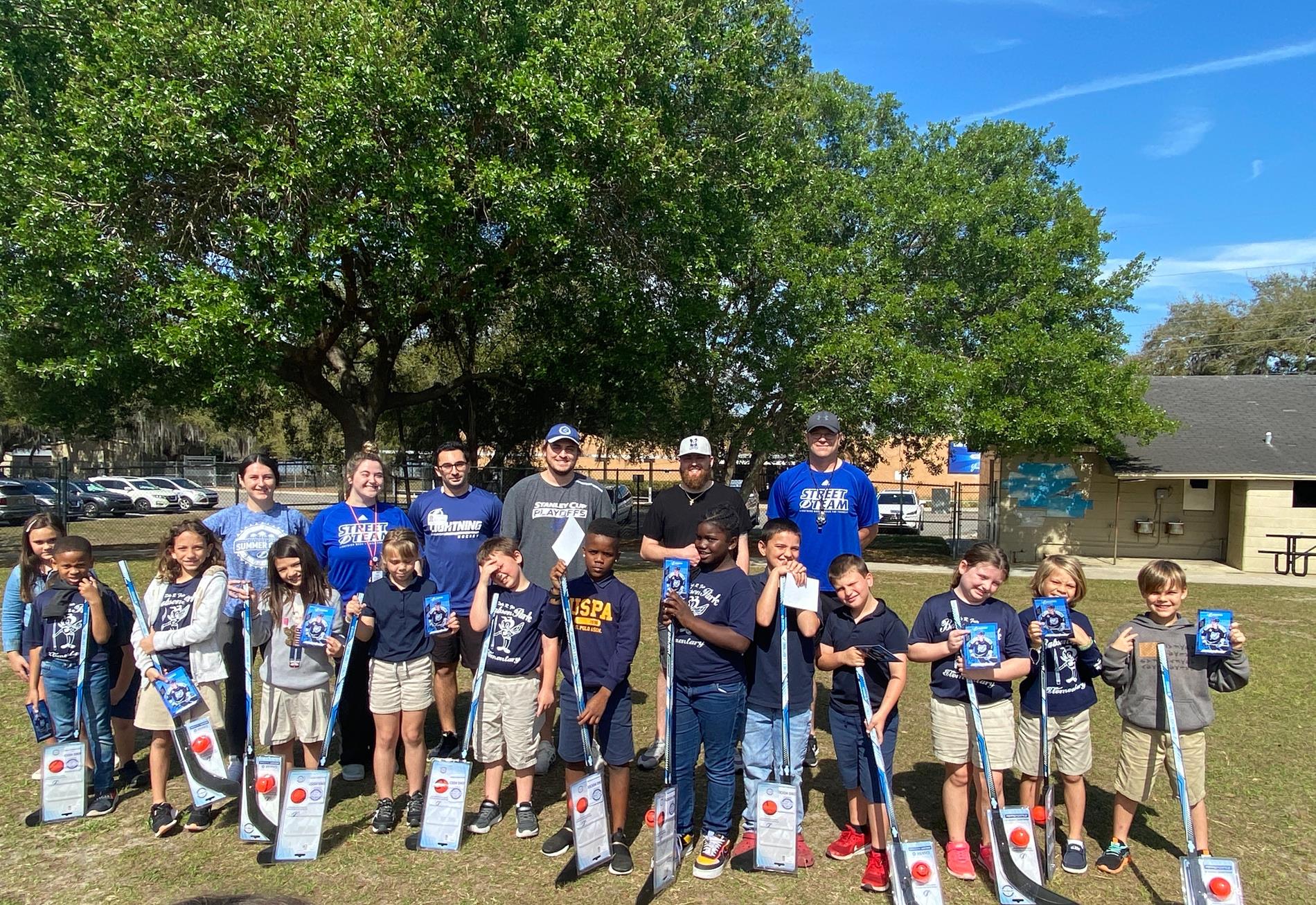 2nd grade students with the Street Hockey Team