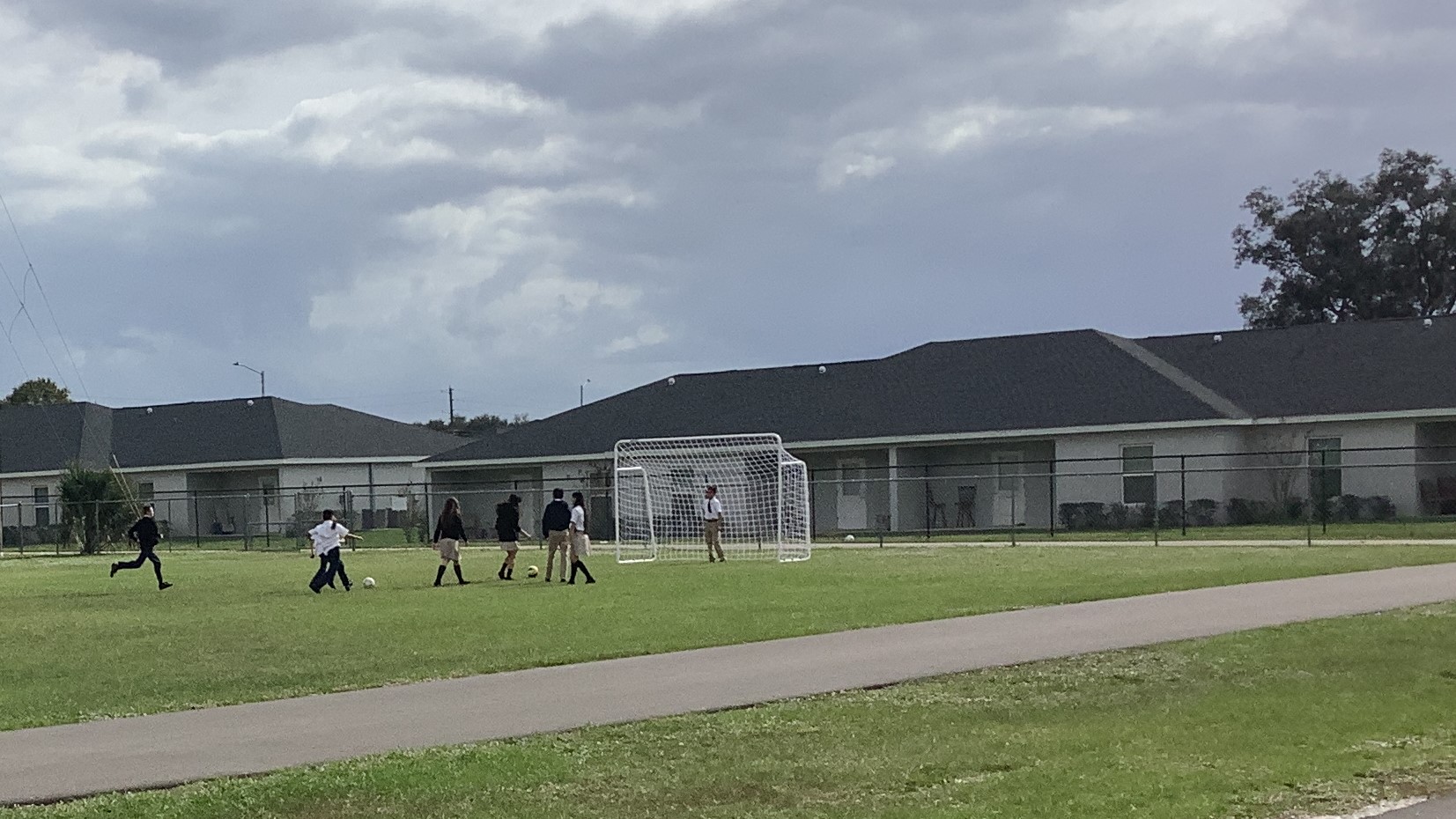 Students playing soccer at recess