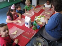 children at table eating