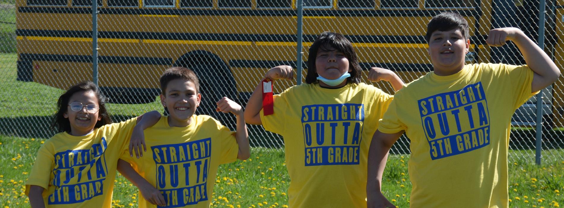 5th grade students flexing their biceps