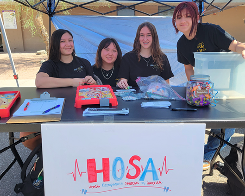 Nursing (HOSA) students in booth at LHHS Open House