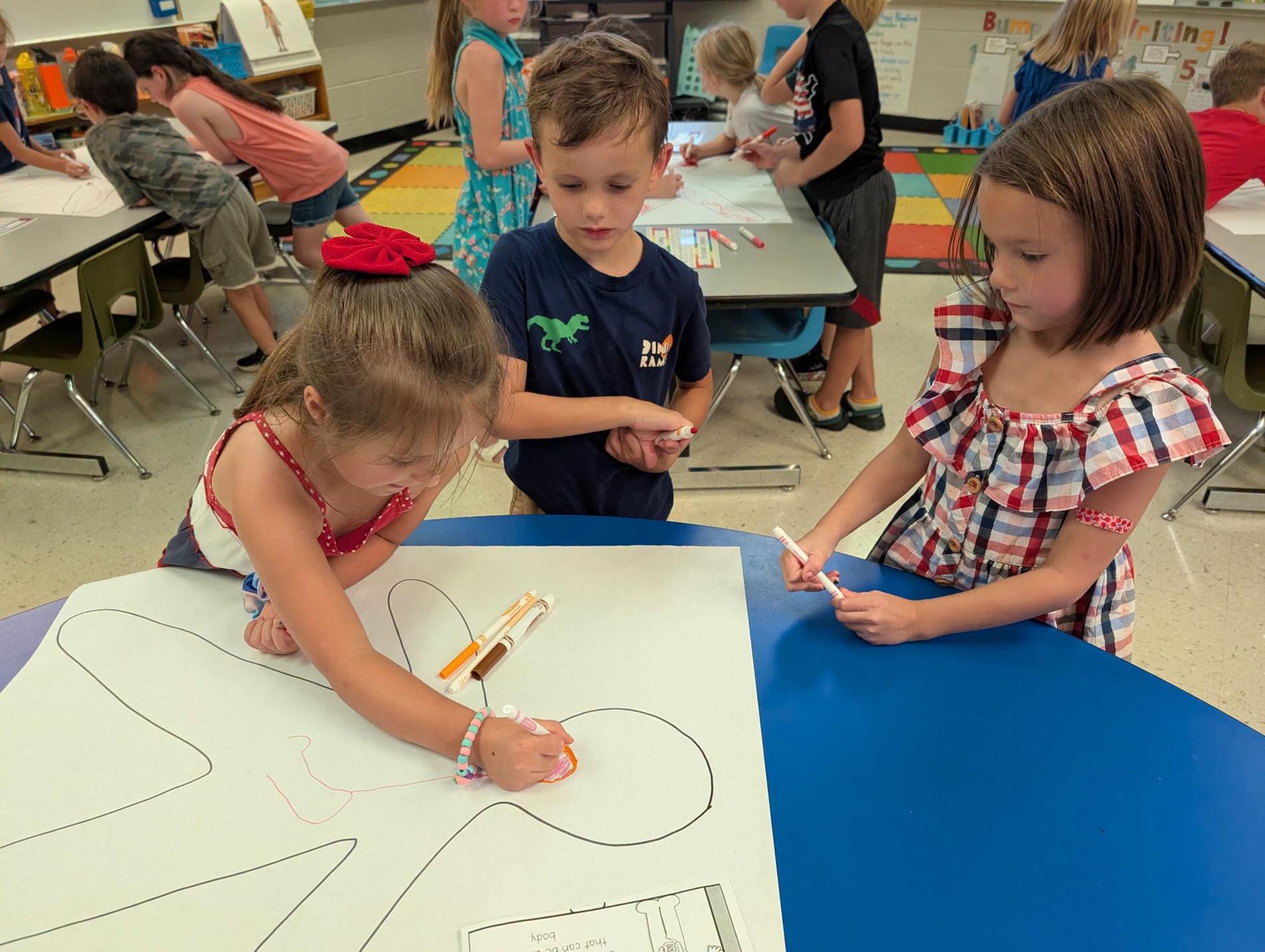 Students working on body drawing