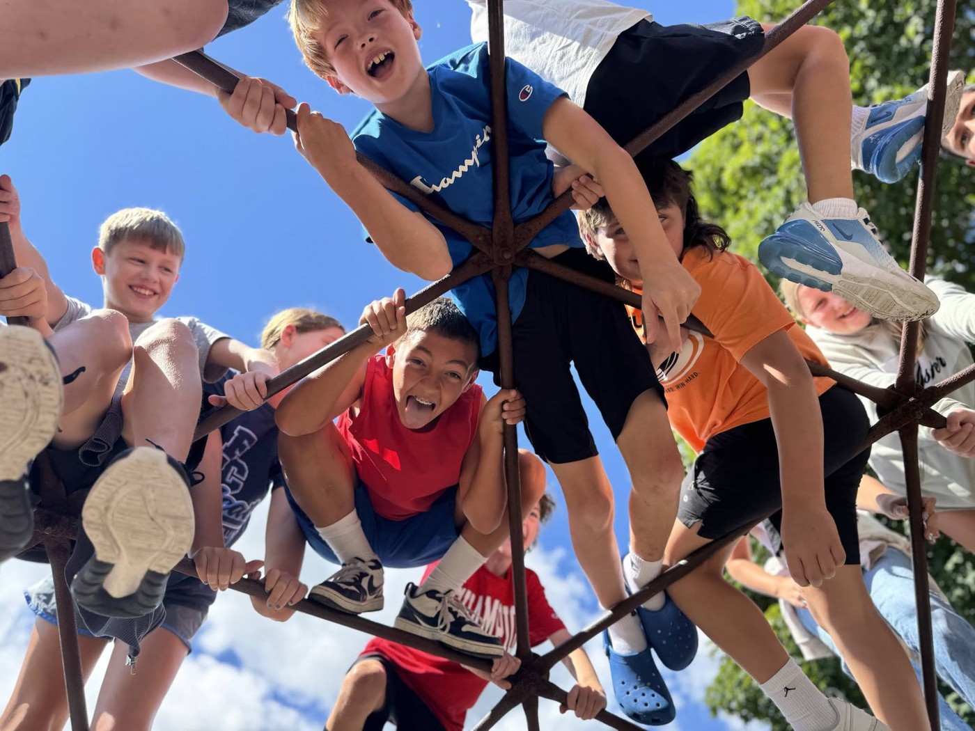 Elementary students on a jungle gym.