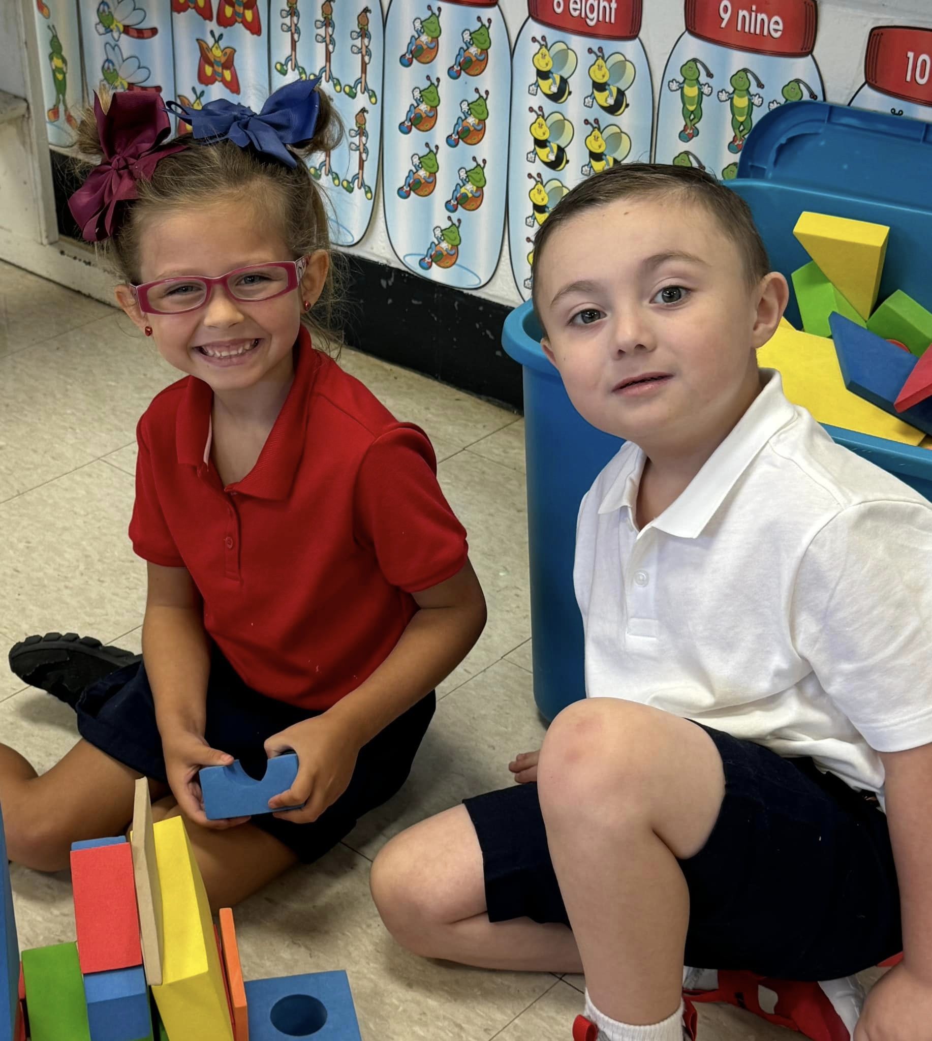 kindergarten students with blocks