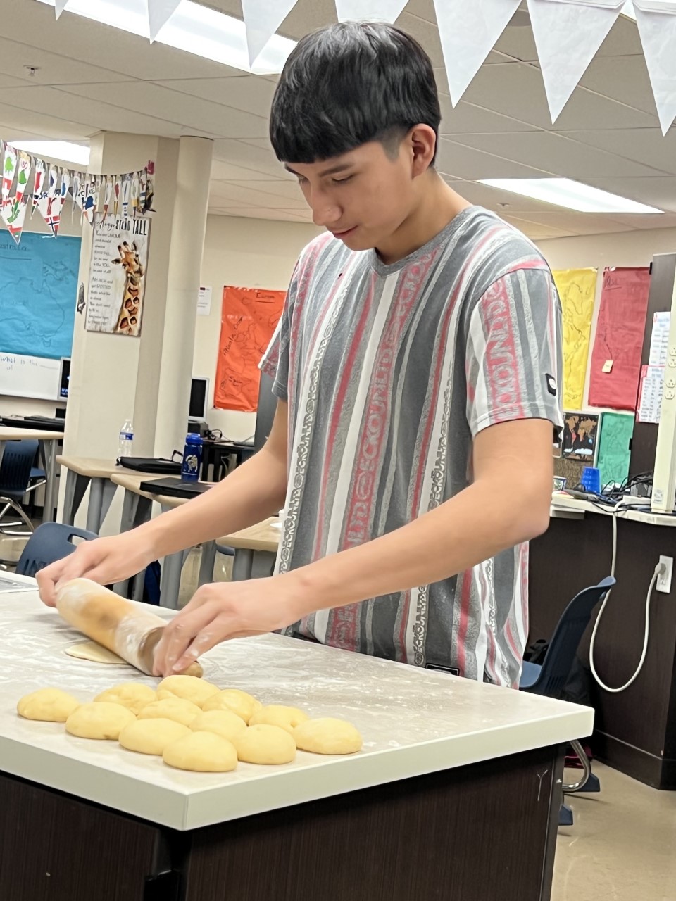 Student making Siu Pao