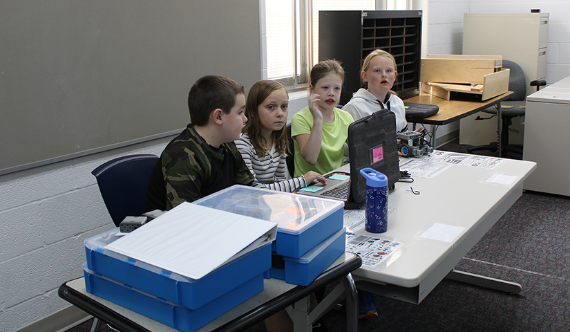 Learning to program their robot