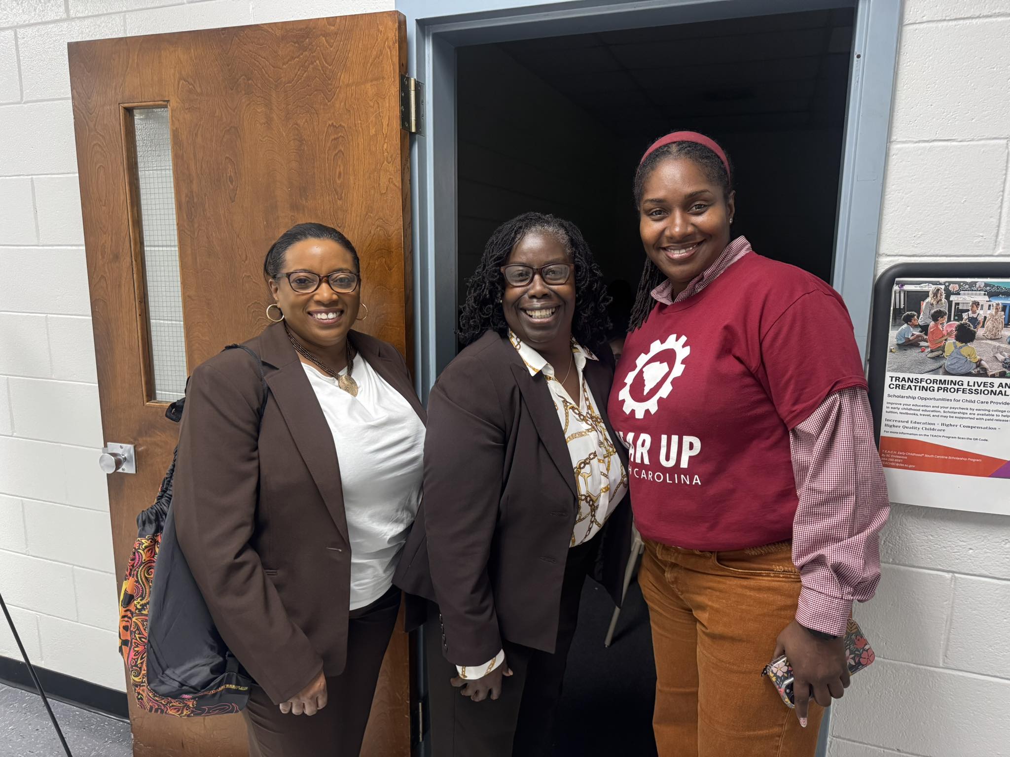 three ladies standing