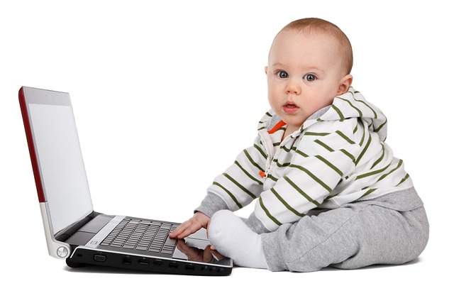 baby boy with computer