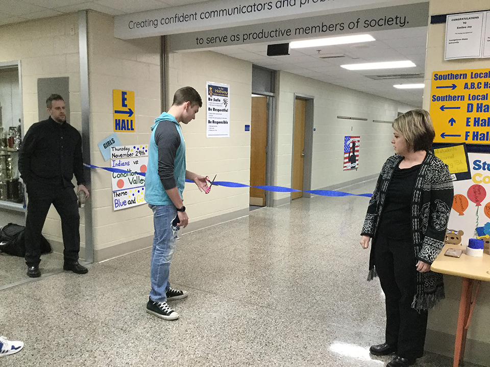 cutting the ribbon