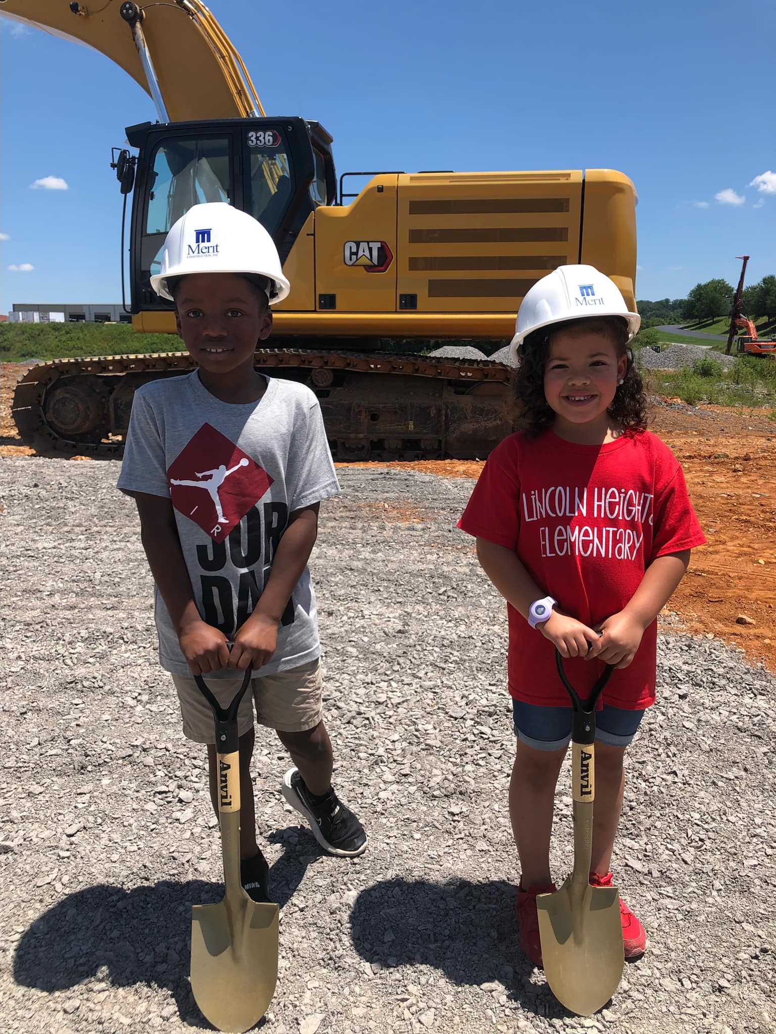 Two Lincoln students at the groundbreaking of the new school building