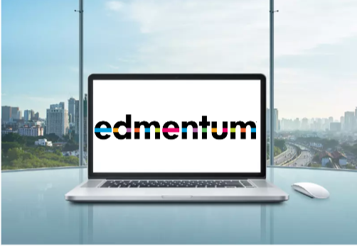 laptop sitting on desk with the word edmentum on the display 