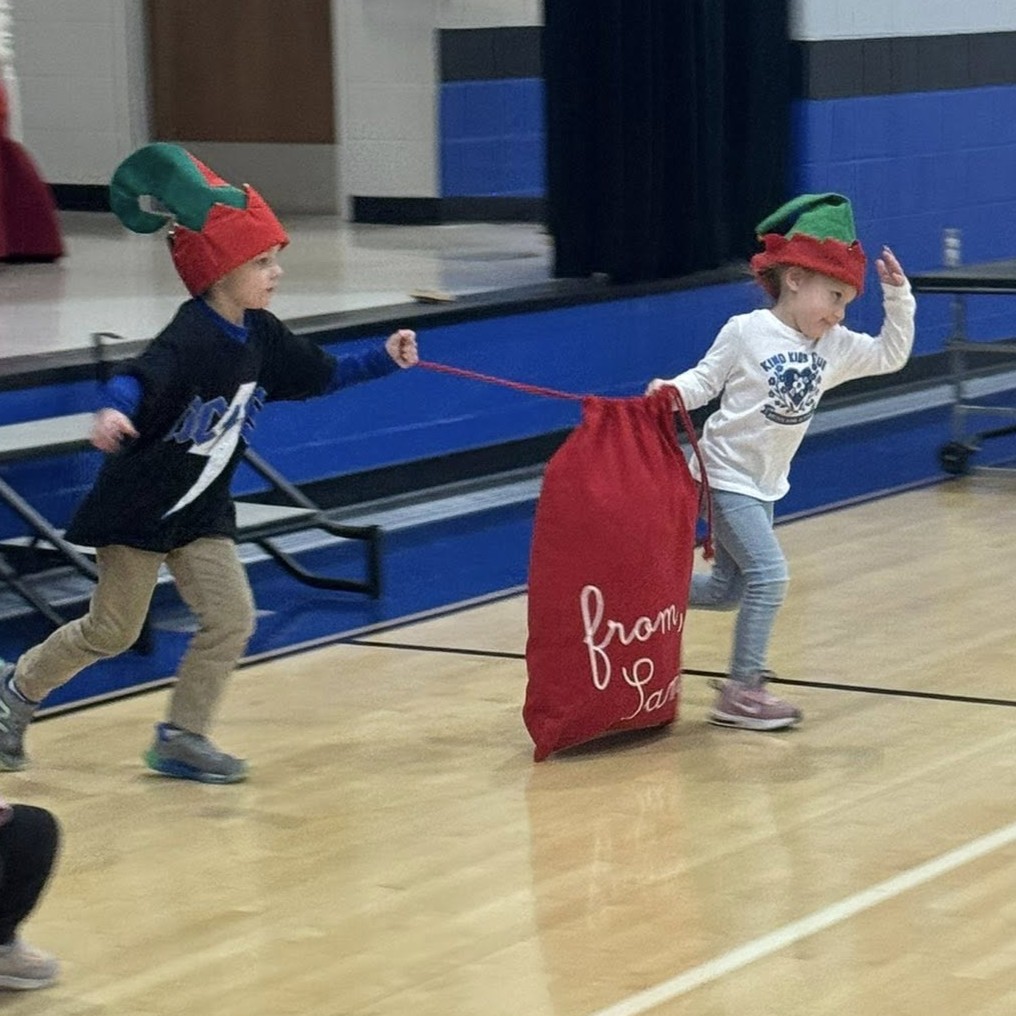 Kindergarten elves fill Santa's sleigh