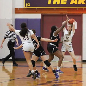 LHHS Girls basketball player gets ready to pass the ball