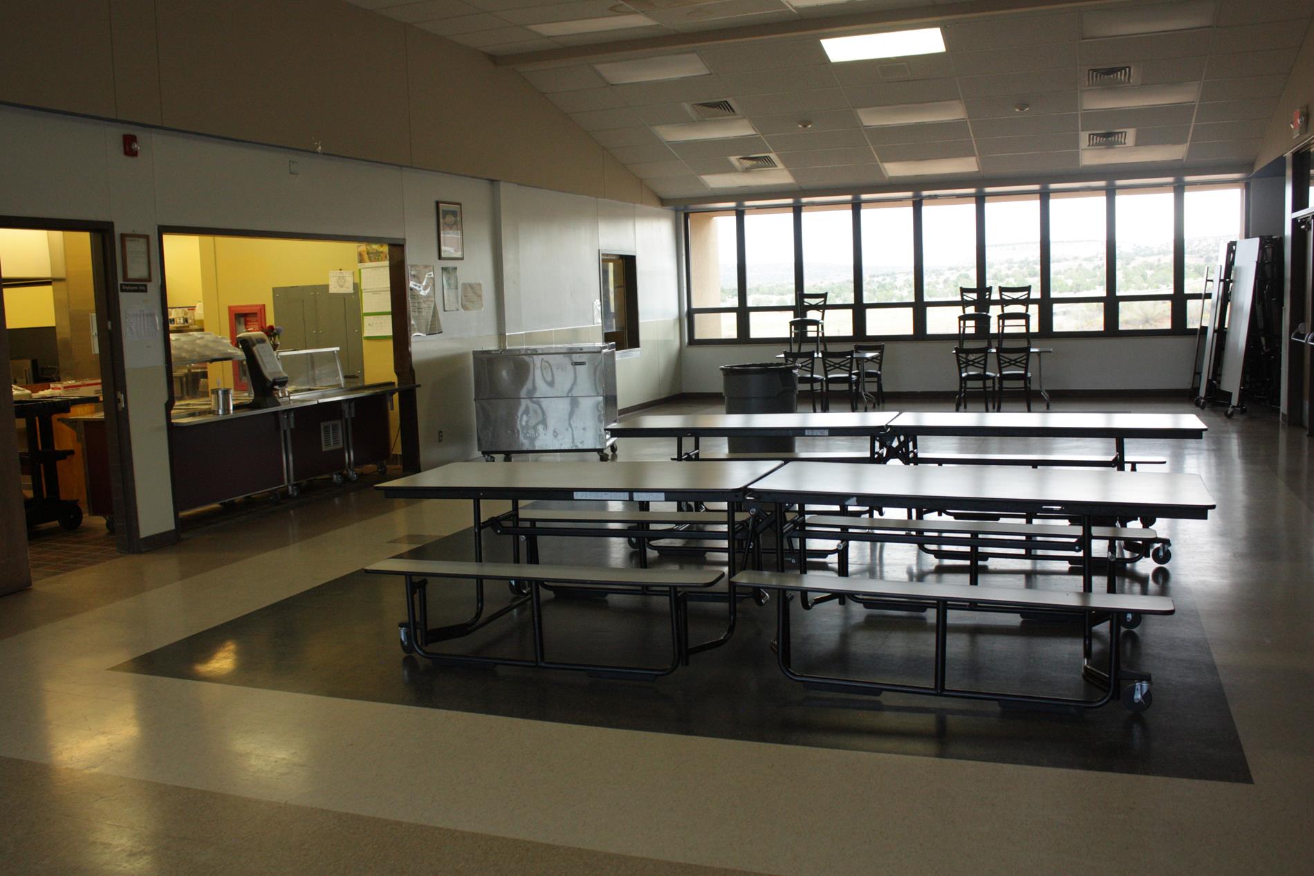 view of cafeteria with tables