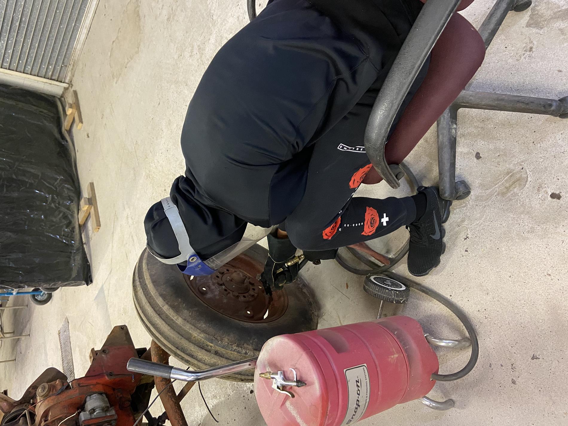 Gabrielle sandblasting a rim