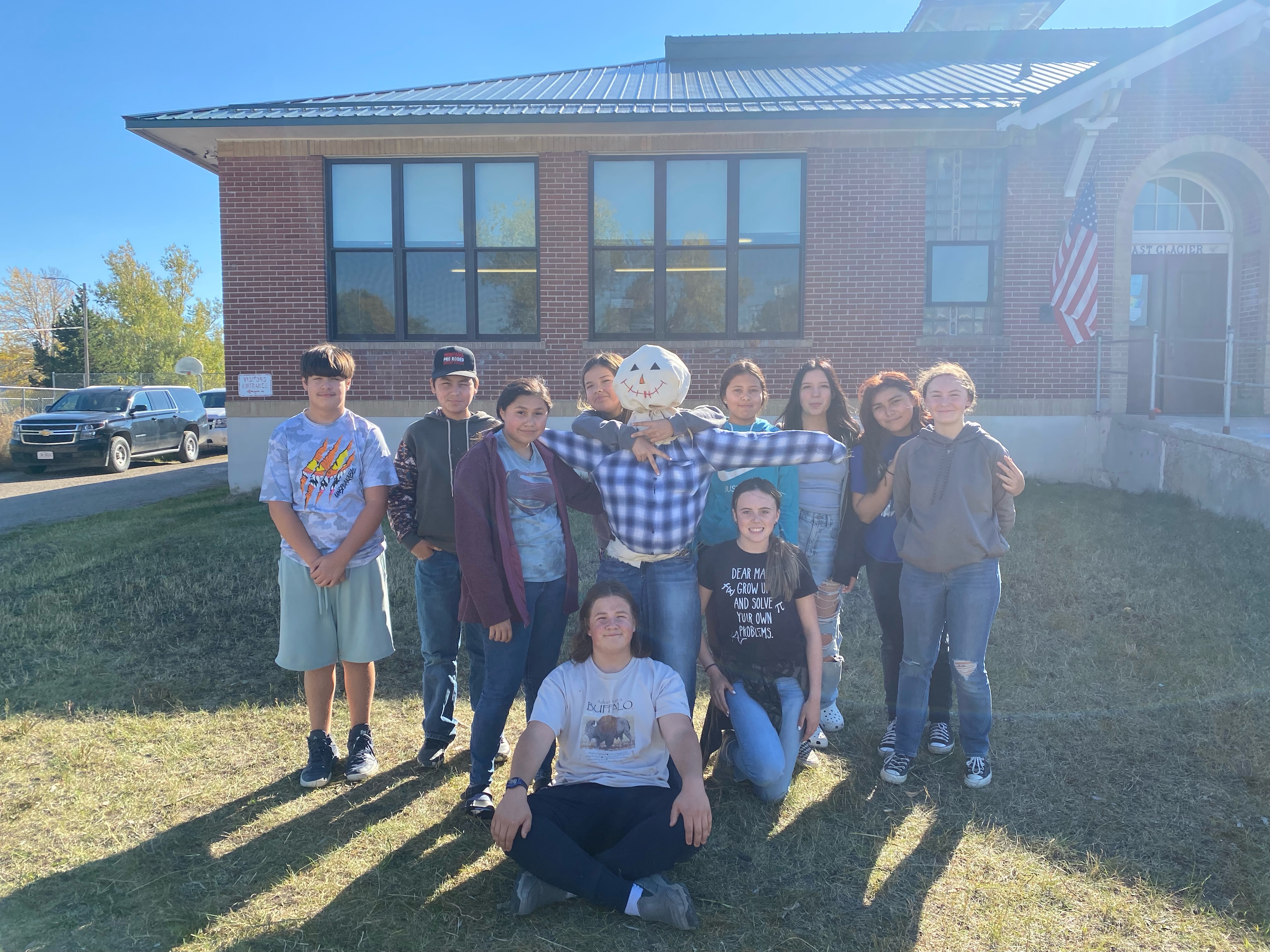 Students Posing with Their Scarecrow