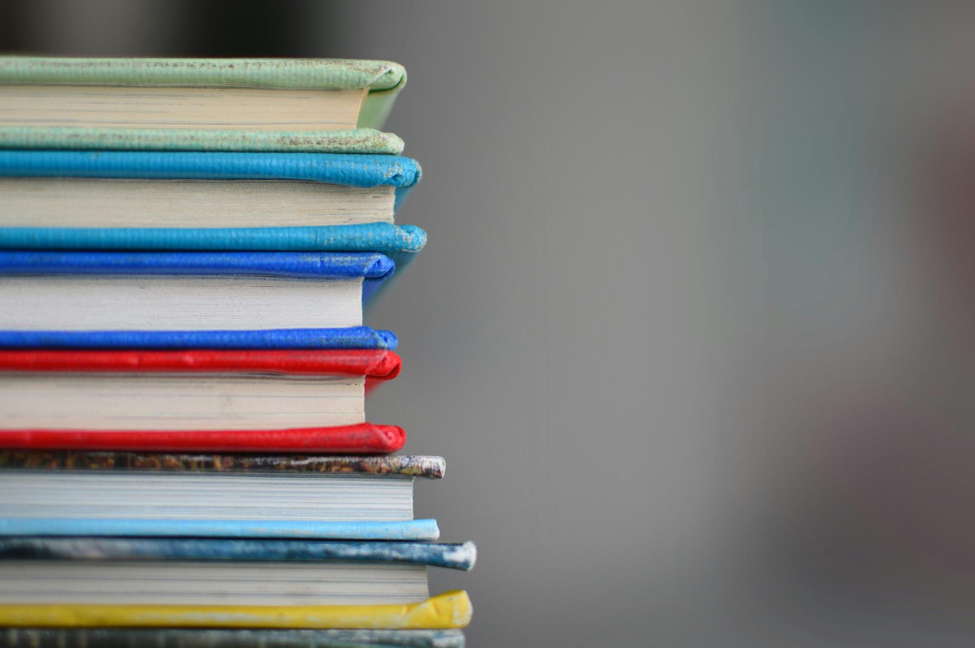 A stack of multicolored books