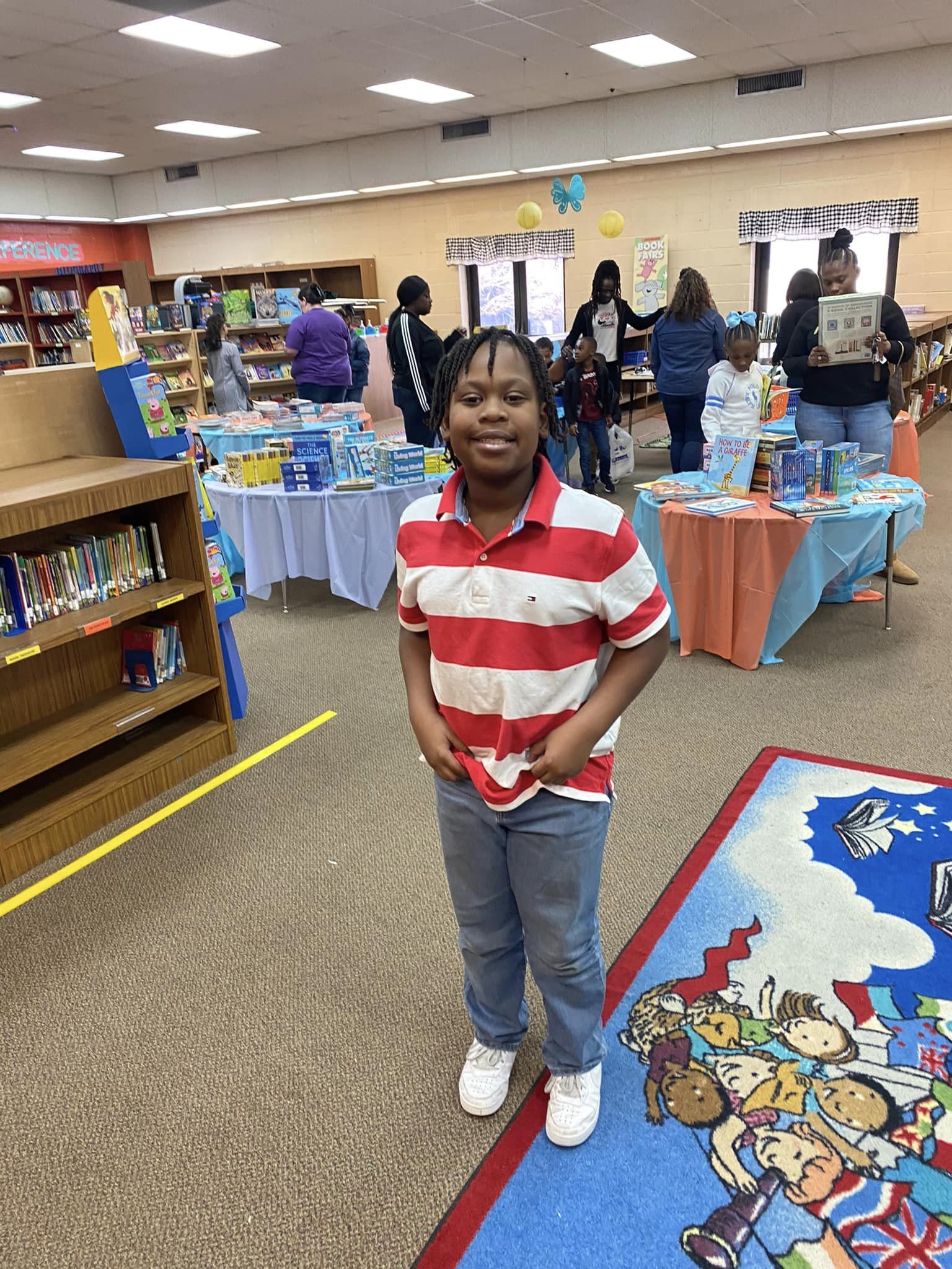 Student at the book fair in the library