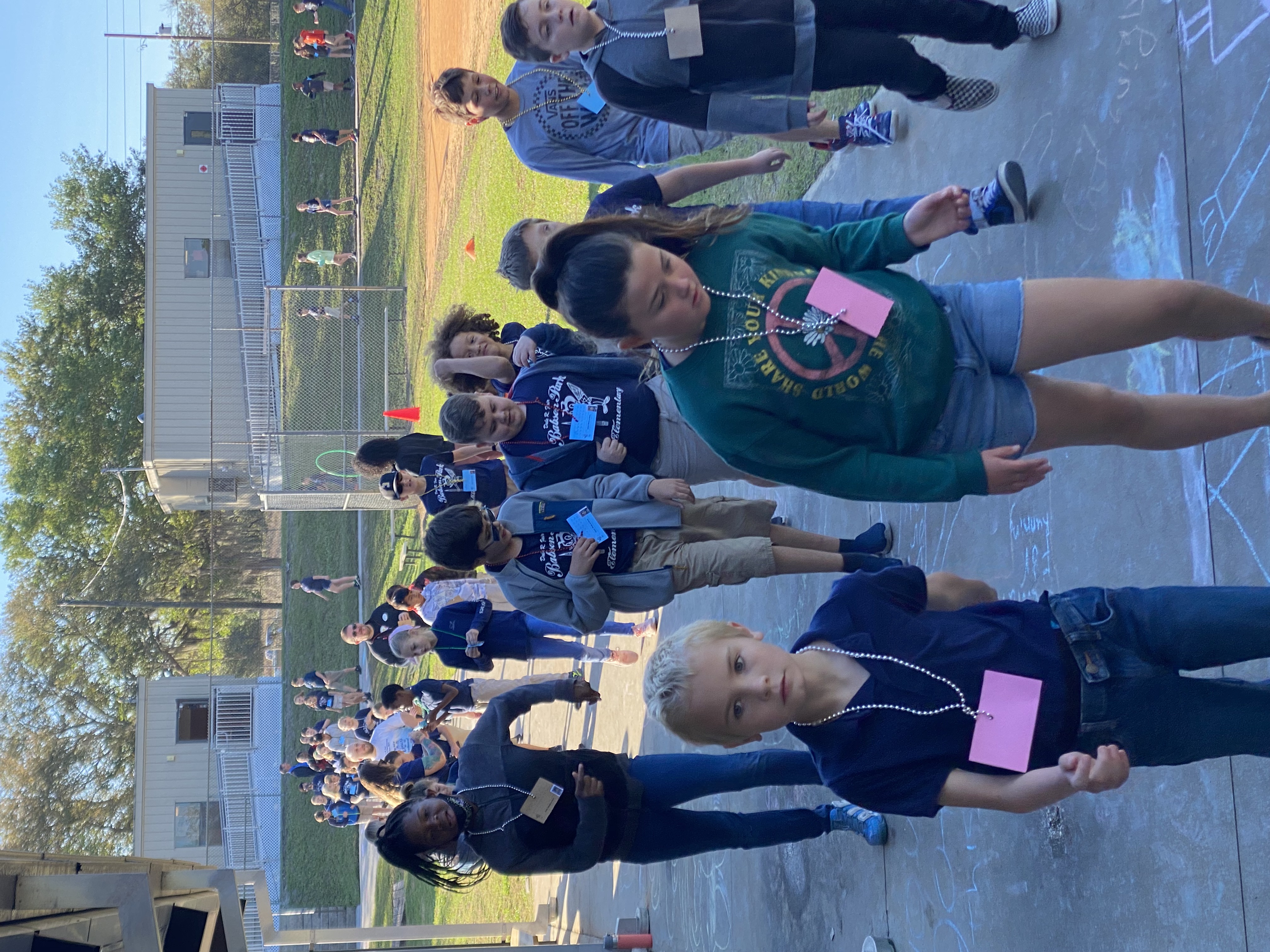 3rd, 4th, and 5th grade students walking 