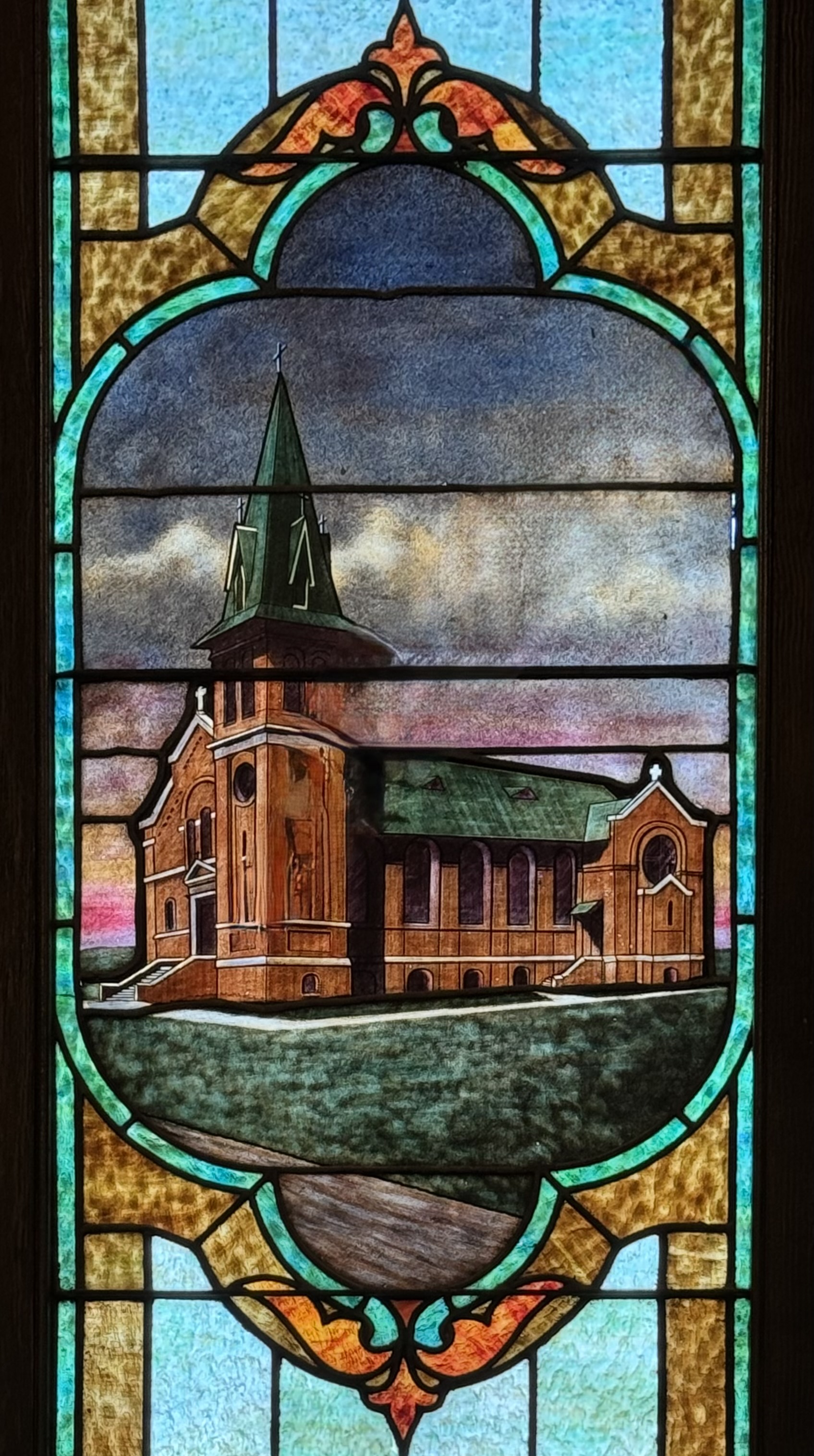 Stained Glass Window of our current Church