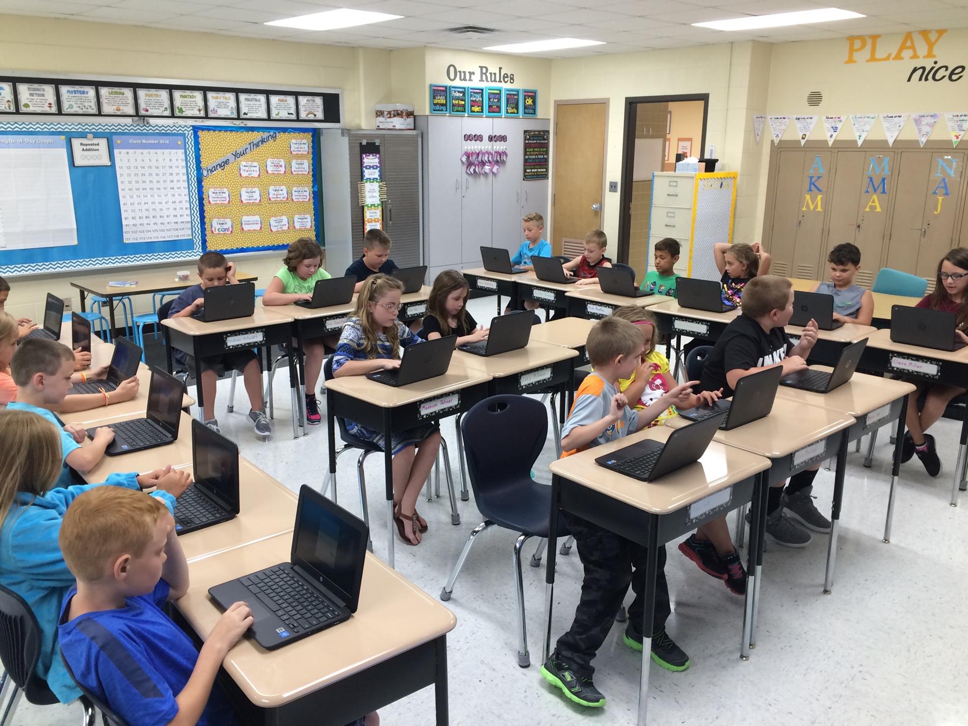 Students using Chromebooks.