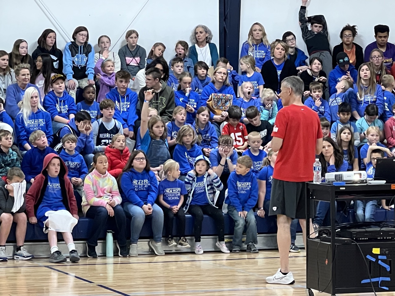 teacher and students in gym