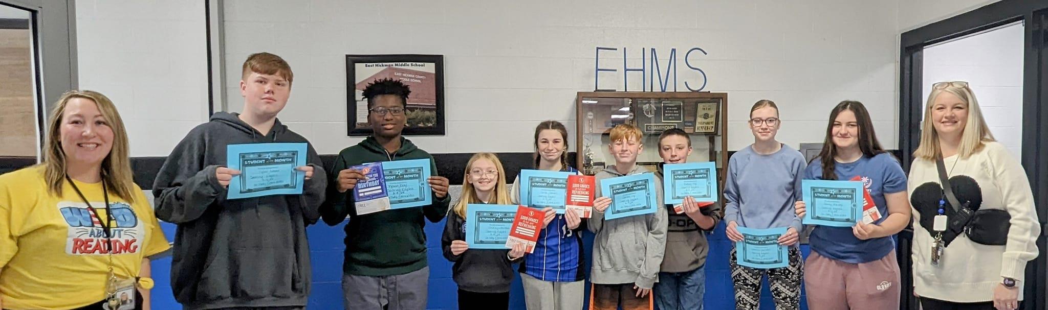 EHMS Students posing with certificates for reading
