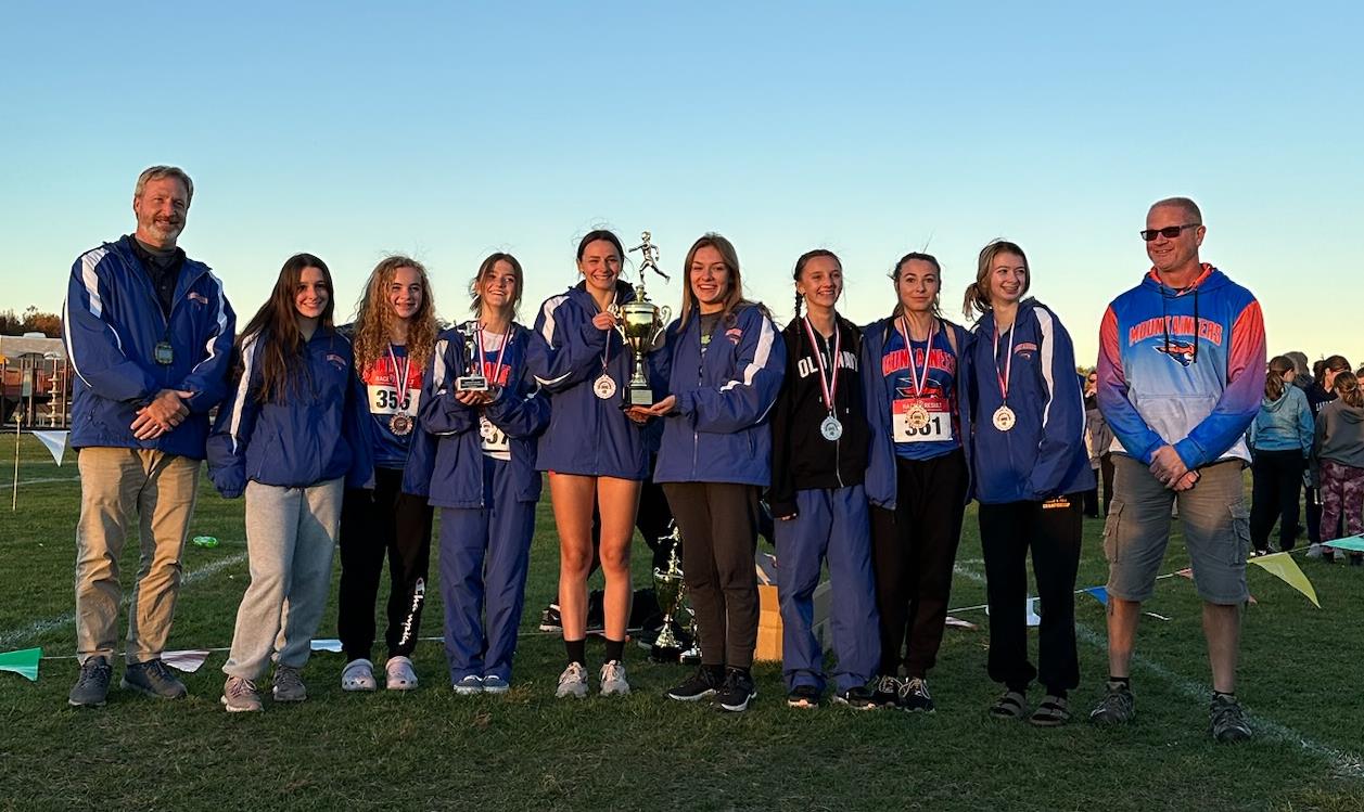 Girls Cross Country Team with coaches