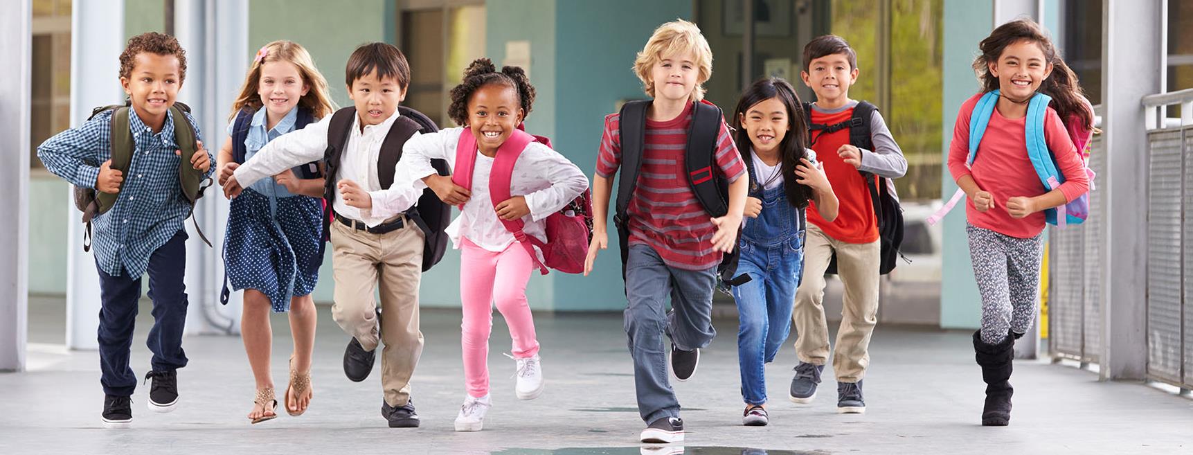 Photo of Students Running in a Hallway Photo of Students Running in a Hallway