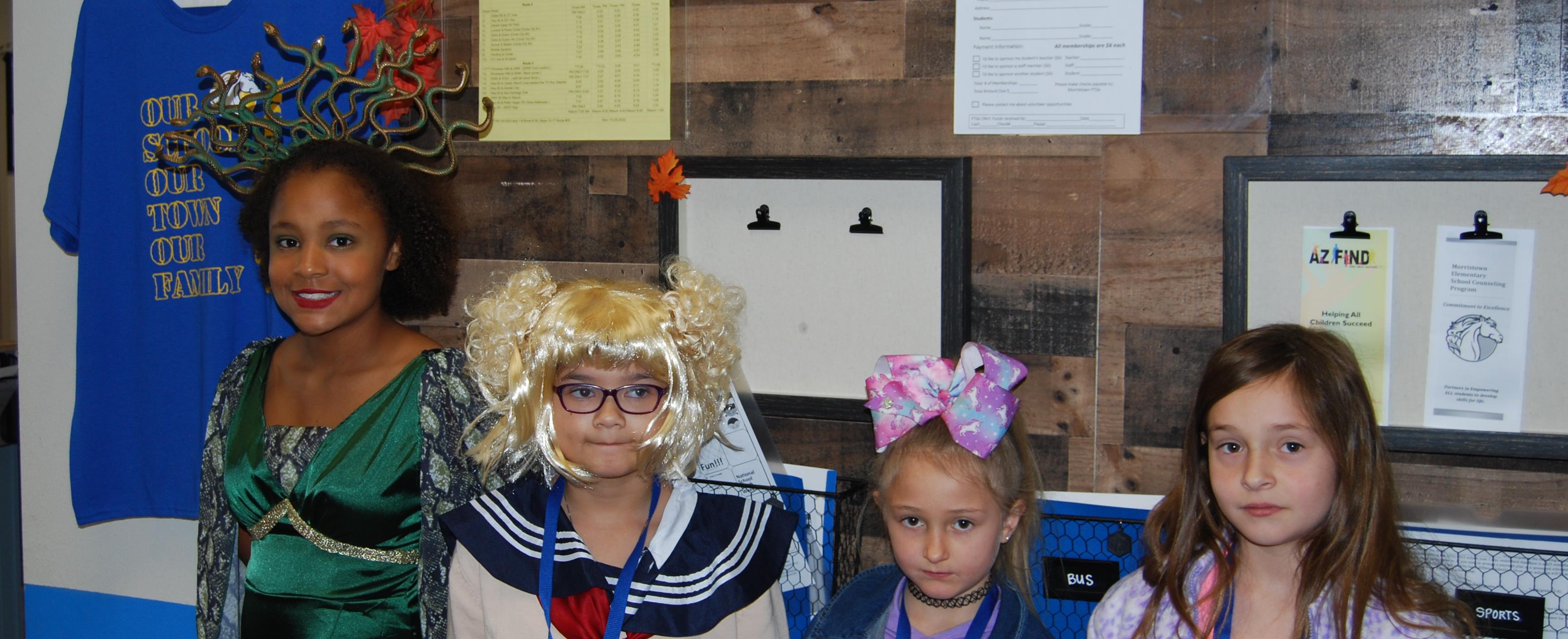 Children dressed up in Halloween costumes