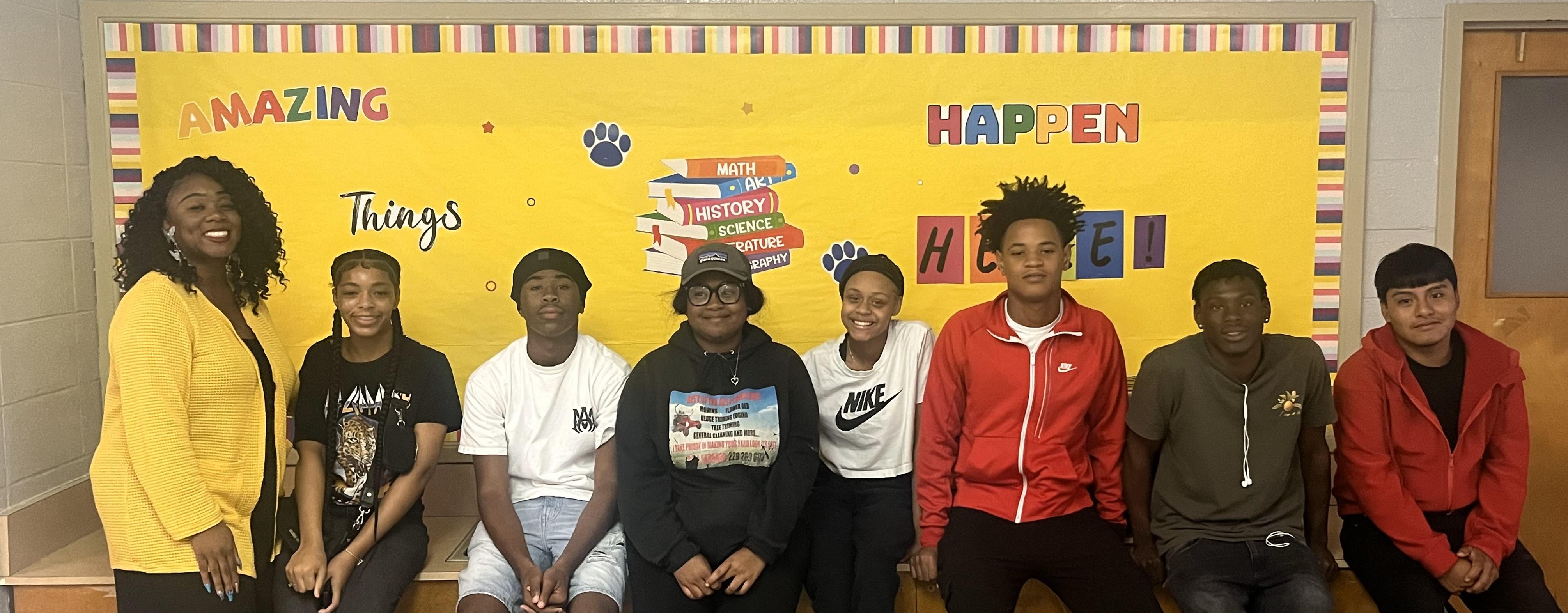 Students posing with Teacher (on left)