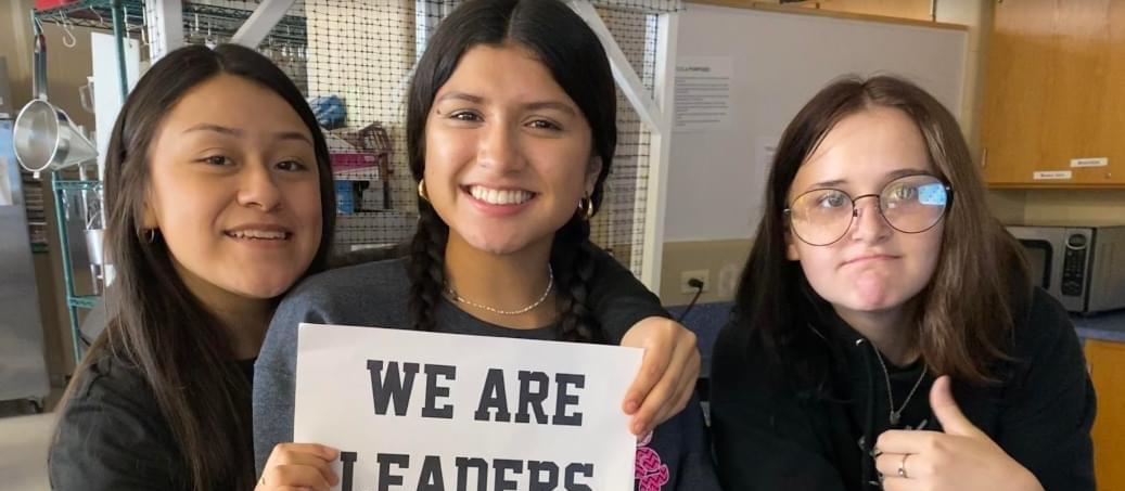 We are Leaders sign held by students