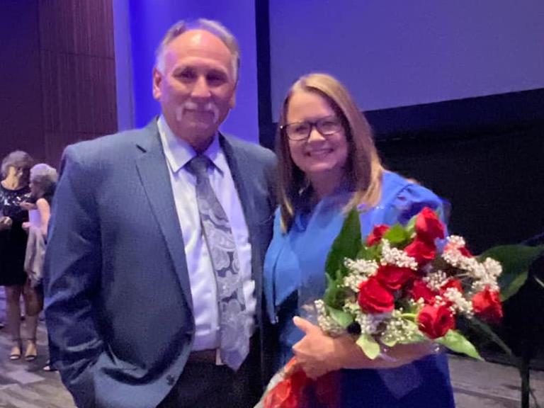 Ada Superintendent Mr. Anderson and Rachel Keith pose for the camera at the Oklahoma Teacher of the Year Banquet
