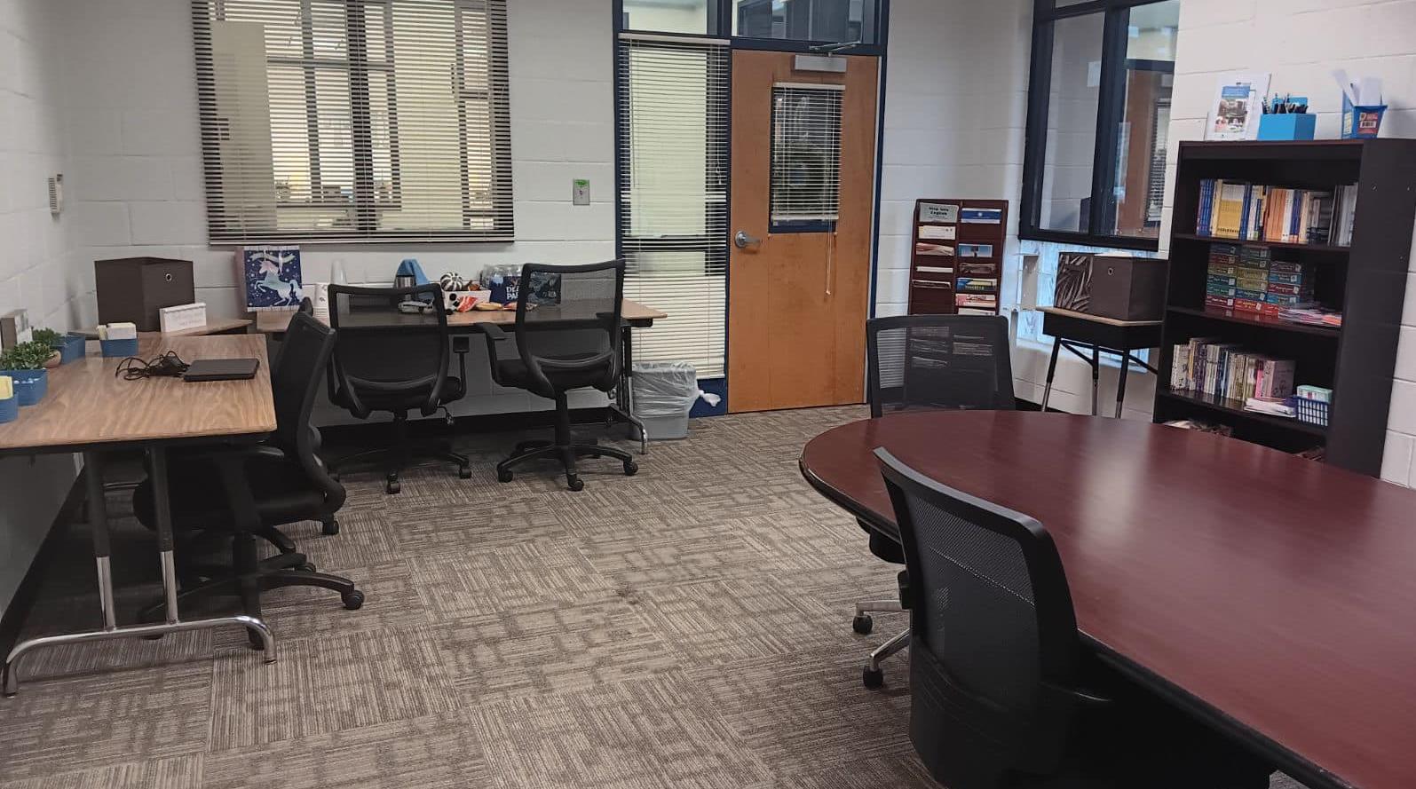 parenting center picture of desk, books, and games